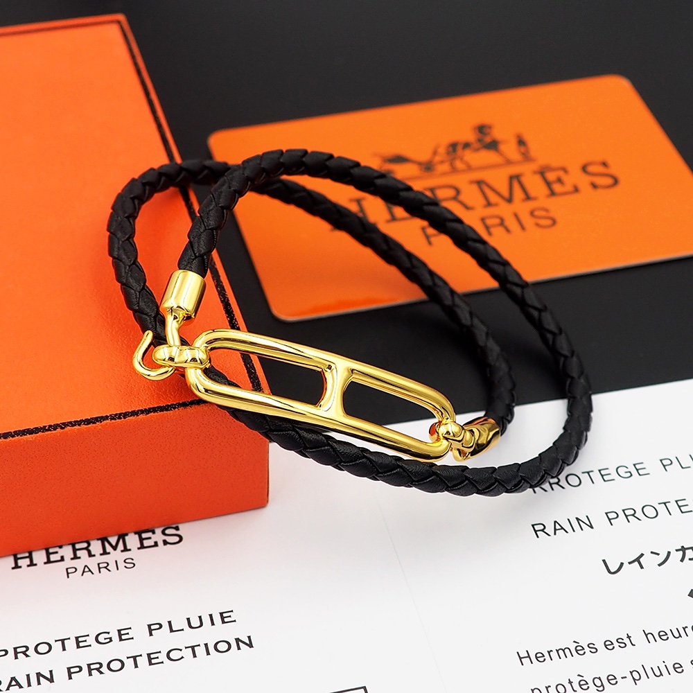 Bracciale Hermes Roulis in pelle intrecciata nera con hardware in metallo placcato oro 40 cm doppio giro