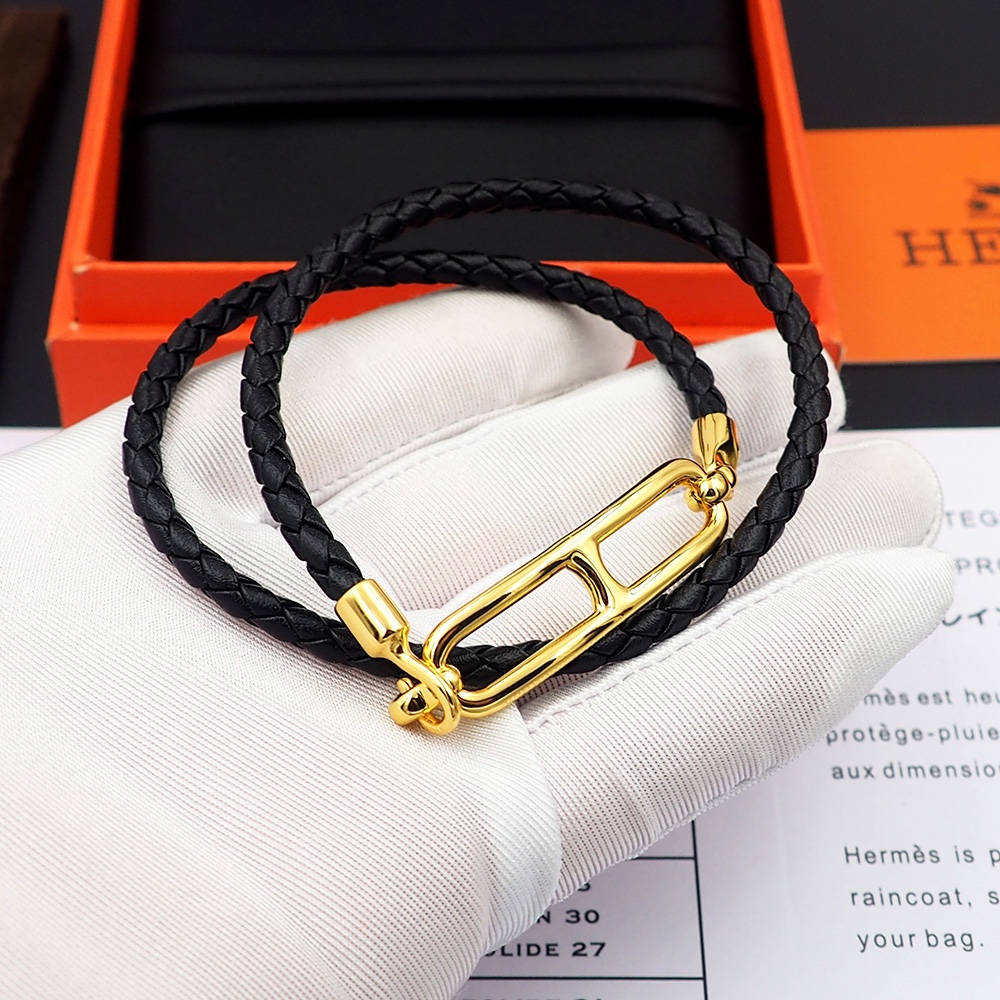 Bracciale Hermes Roulis in pelle intrecciata nera con hardware in metallo placcato oro 40 cm doppio giro