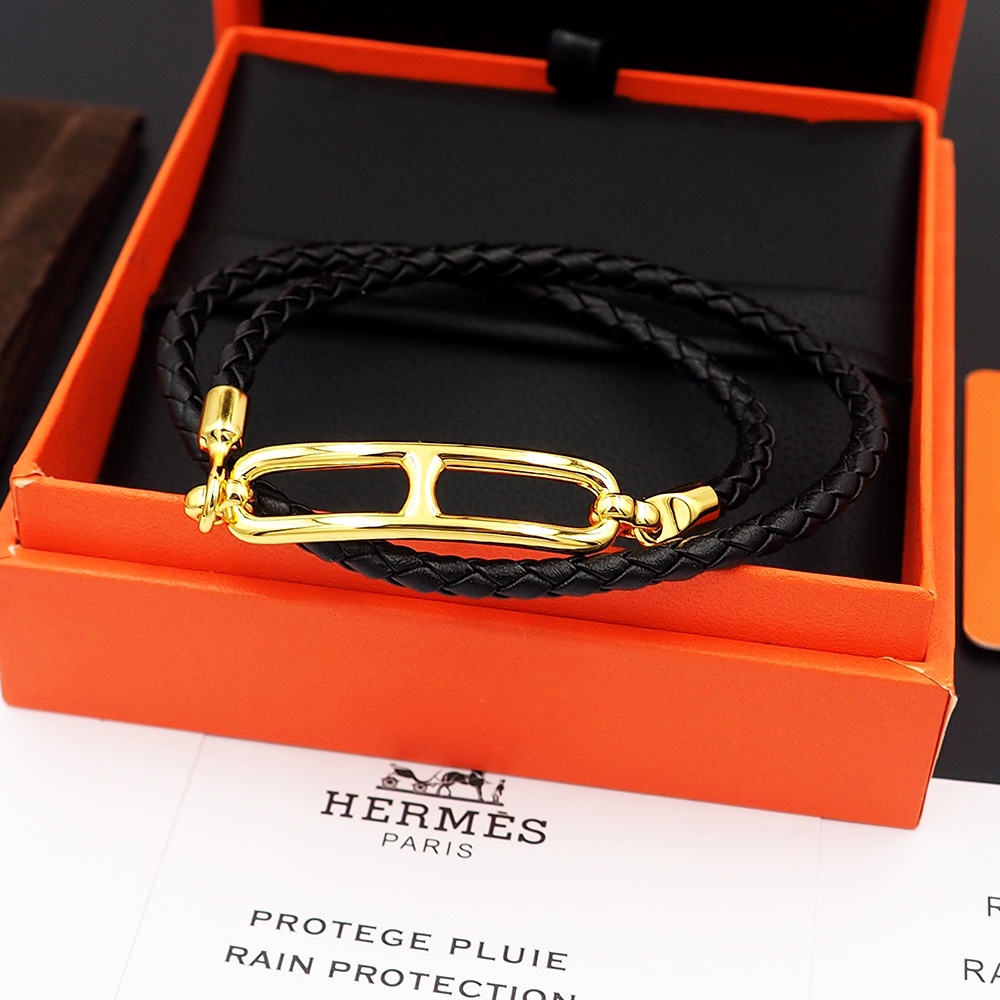 Bracciale Hermes Roulis in pelle intrecciata nera con hardware in metallo placcato oro 40 cm doppio giro