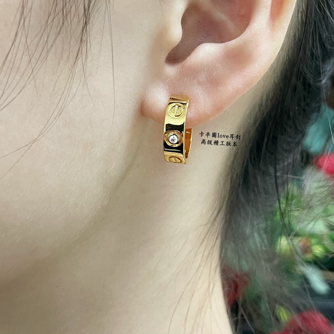 Cartier LOVE earrings 18k yellow gold 18k white gold with clear diamond accents 13mm outer diameter