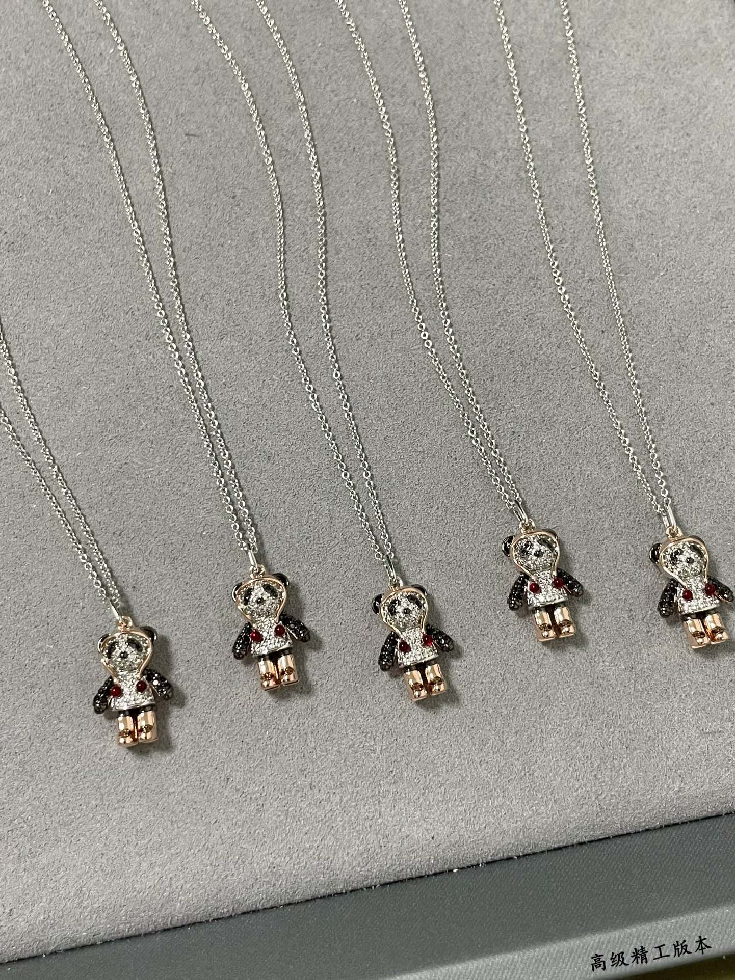 Qeelin V BoBo necklace Silver-toned chain rose gold plated limbs pave set clear diamonds black gemstone panda details red gemstone accents 42cm with 5cm extender