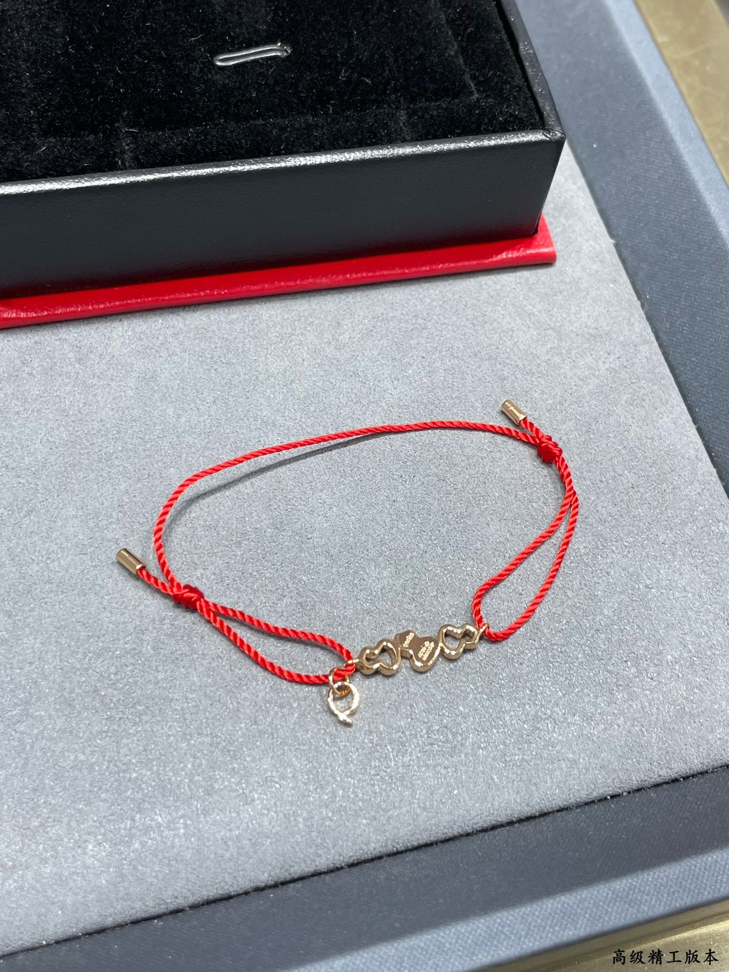 Qeelin Wuluwulu bracelet 18K rose gold red cord clear diamond pave adjustable sliding knot fits 15-19cm wrist