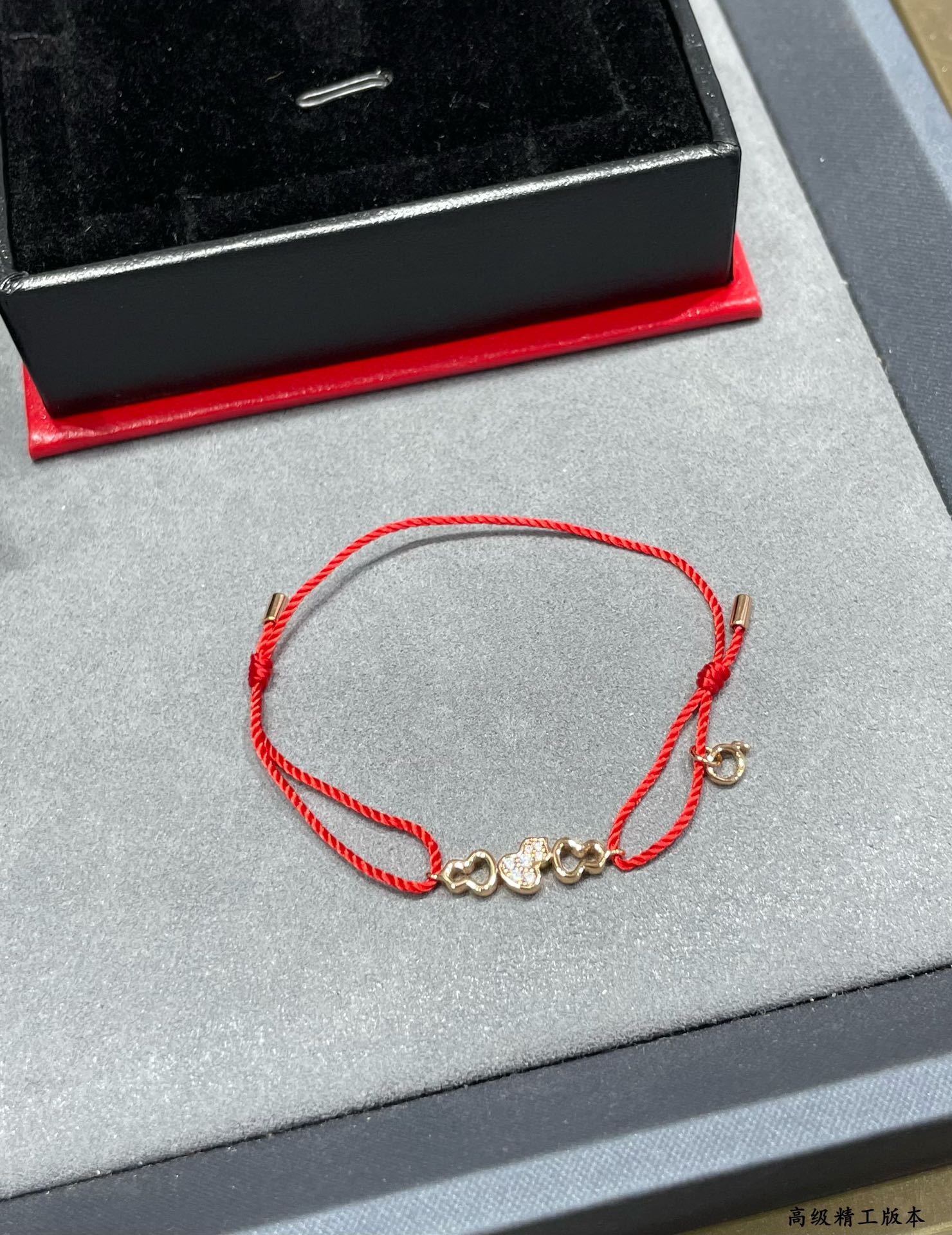 Qeelin Wuluwulu bracelet 18K rose gold red cord clear diamond pave adjustable sliding knot fits 15-19cm wrist