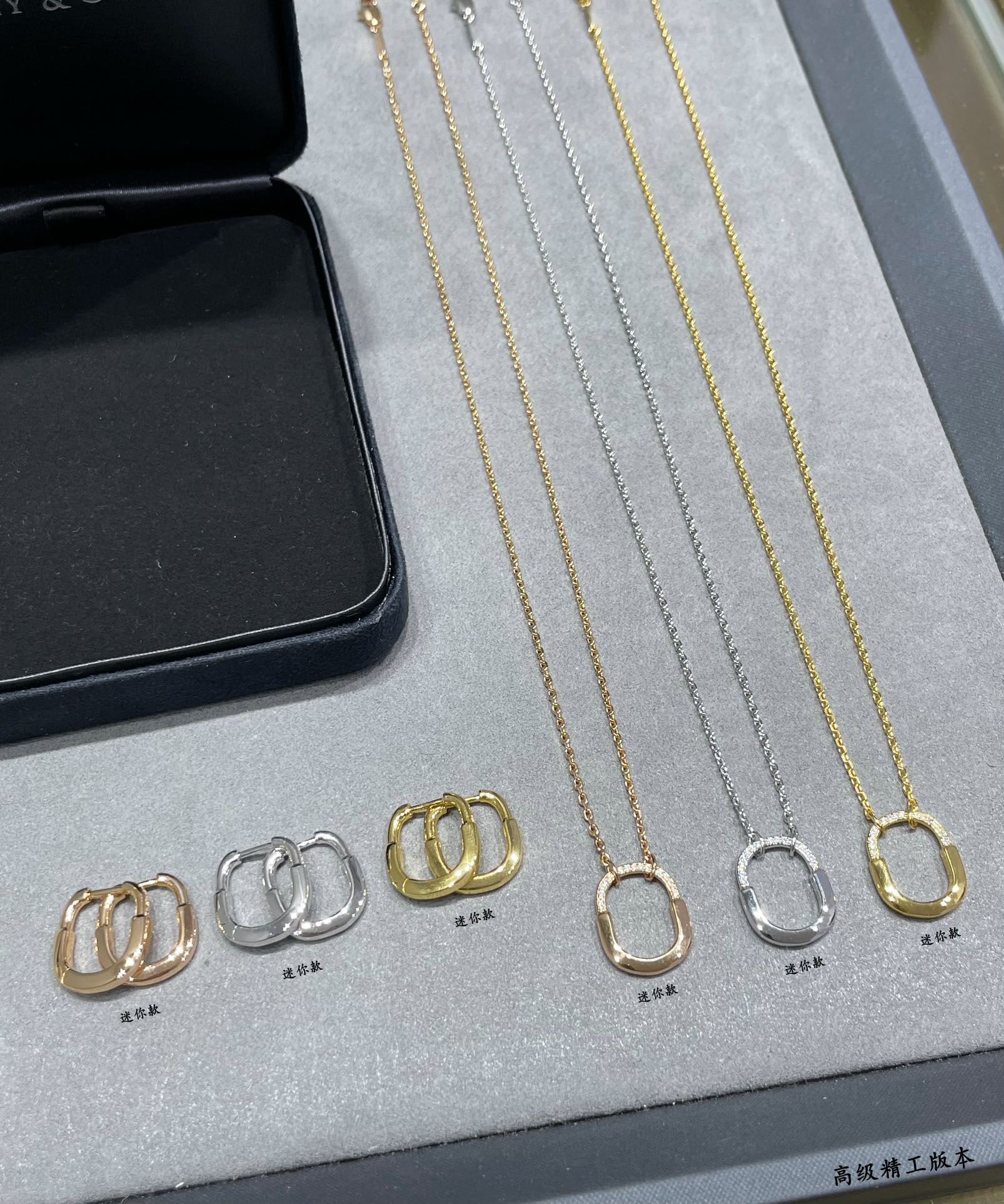 Tiffany Tiffany Lock Mini Hoop Earrings earrings 18k yellow gold 18k rose gold with clear diamond accents Mini 10mm outer diameter