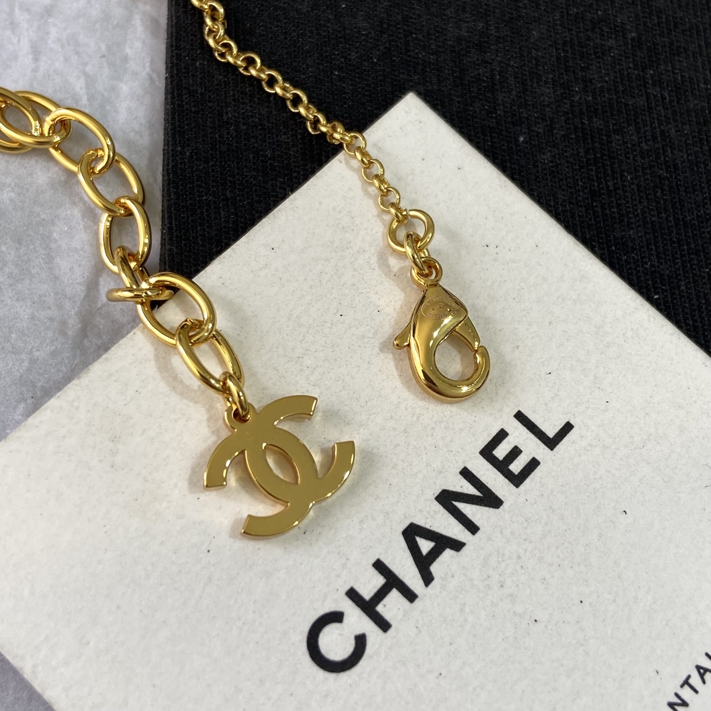 Chanel CC Logo Pearl Resin Ball Pendant Necklace necklace gold tone metal white faux pearl black resin 42cm with 5cm extender