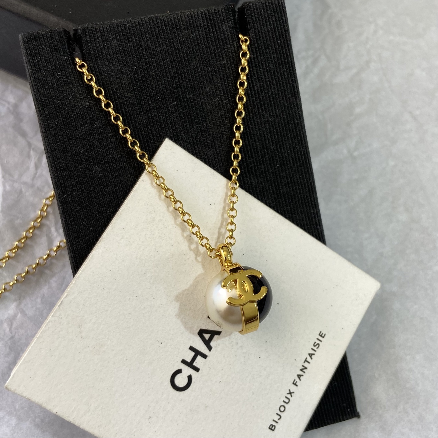 Chanel CC Logo Pearl Resin Ball Pendant Necklace necklace gold tone metal white faux pearl black resin 42cm with 5cm extender
