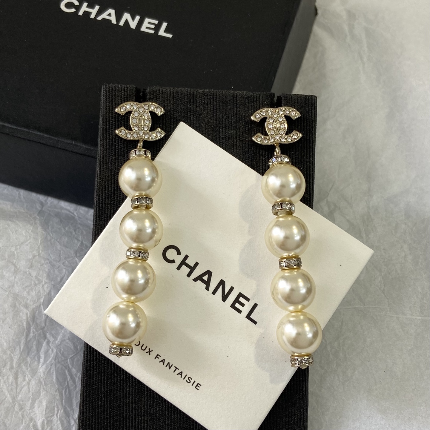 Chanel CC Logo Pearl Drop Earrings earrings Gold-tone metal with clear crystals and cream faux pearls Silver-tone metal with clear crystals and black resin beads 6 5cm length