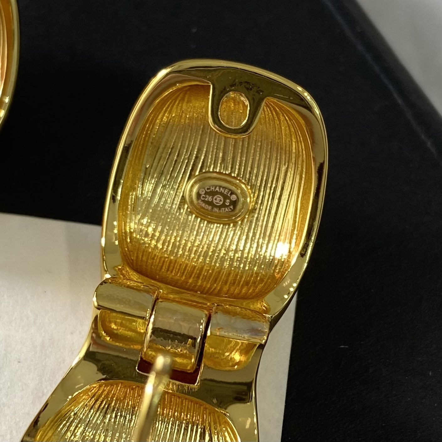 Chanel CC Logo Dome Clip-On Earrings earrings Polished gold-tone metal with black enamel CC logo One Size