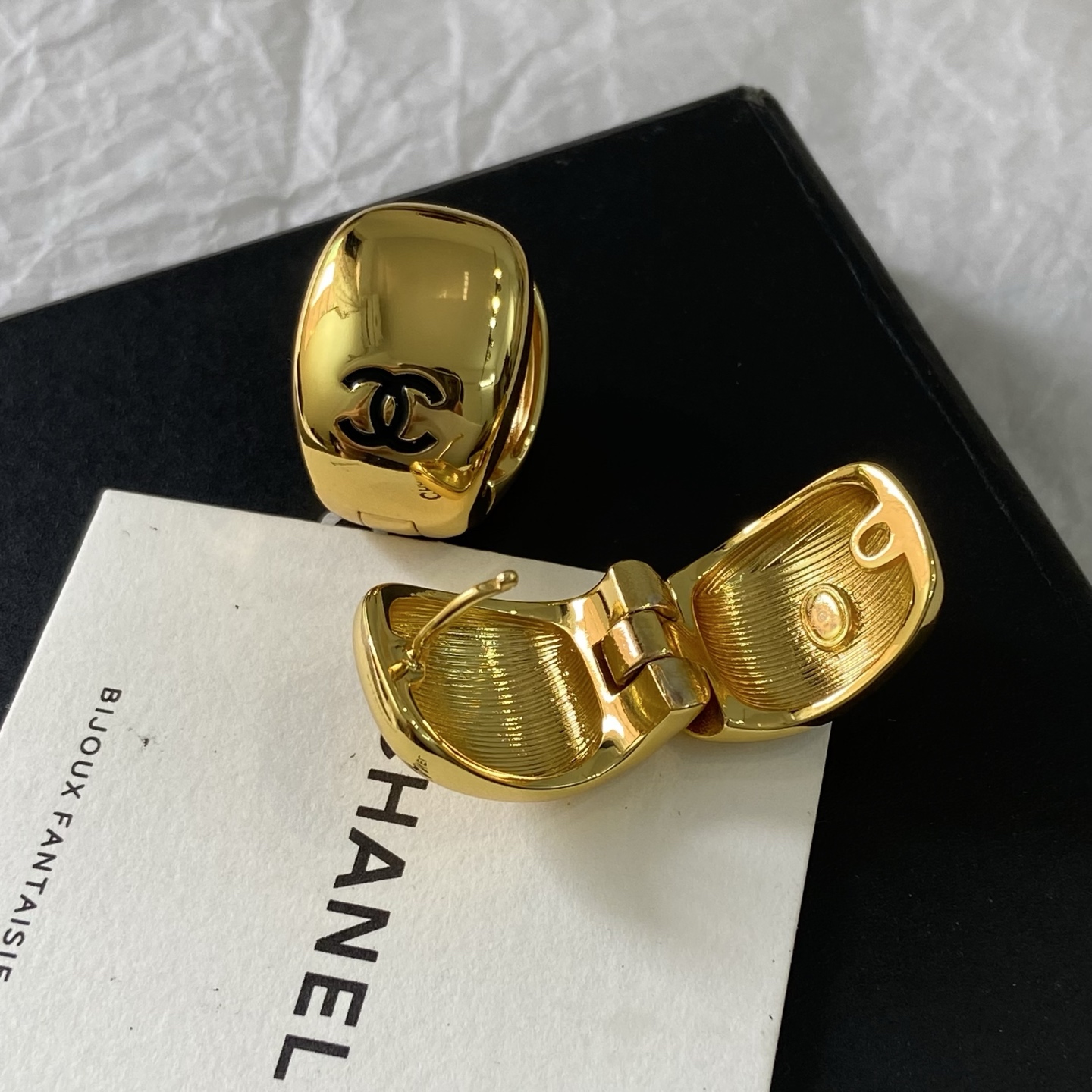 Chanel CC Logo Dome Clip-On Earrings earrings Polished gold-tone metal with black enamel CC logo One Size