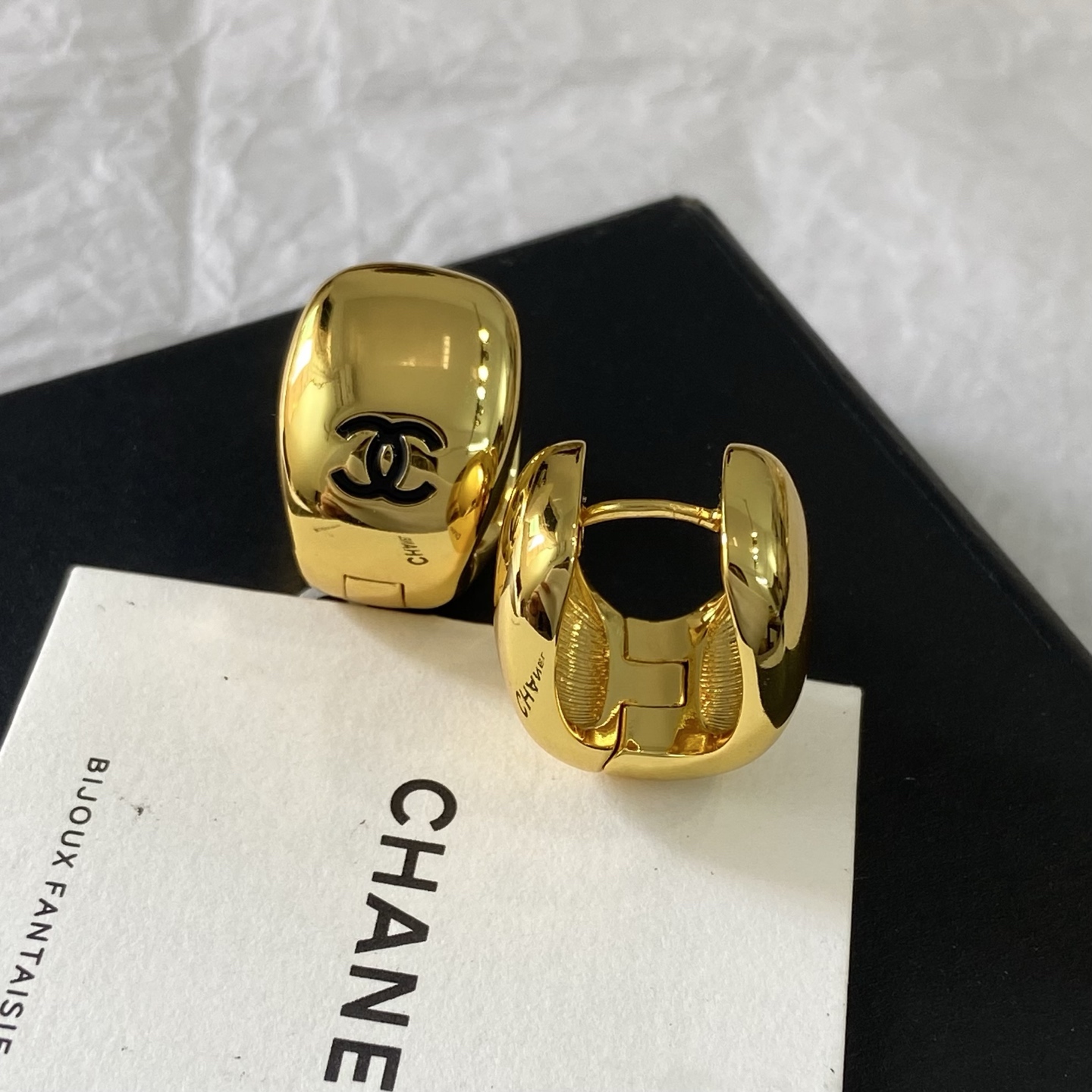 Chanel CC Logo Dome Clip-On Earrings earrings Polished gold-tone metal with black enamel CC logo One Size