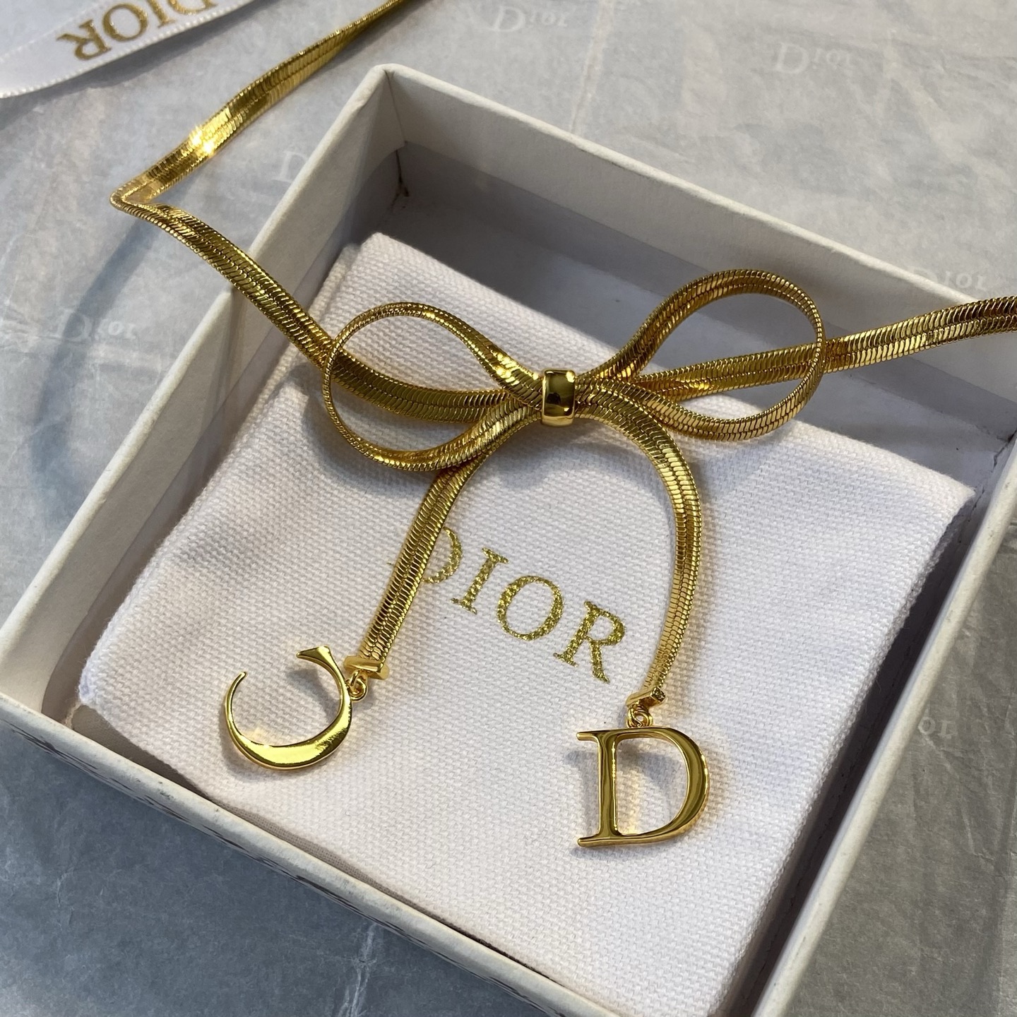 Dior Bow CD Charm Snake Chain necklace gold-tone metal 42cm with 5cm extender