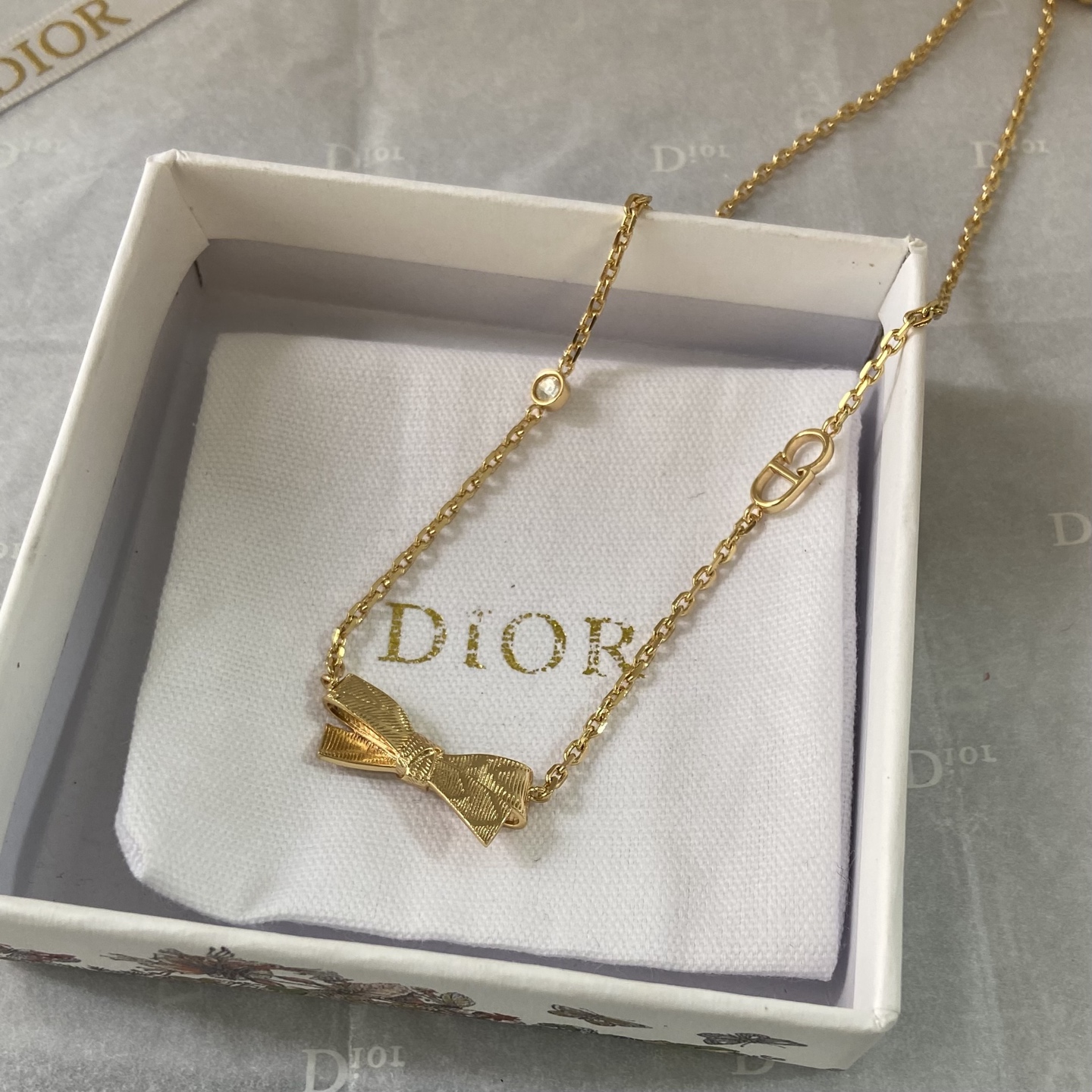 Dior Bow CD Logo Necklace necklace gold-tone metal with clear crystal accent 42cm with 5cm extender