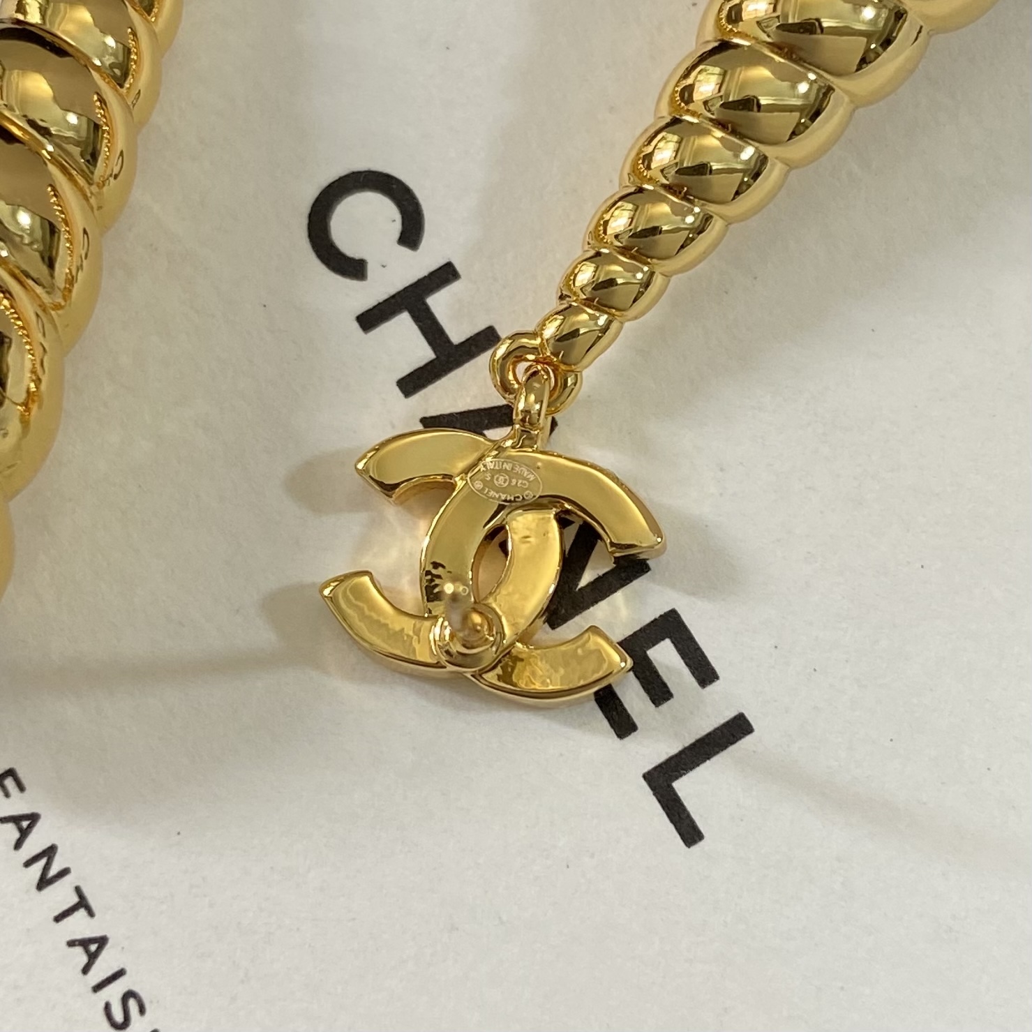 Chanel CC Spiral Shell Pearl Drop earrings gold-tone metal with white baroque pearl 5 5cm drop length
