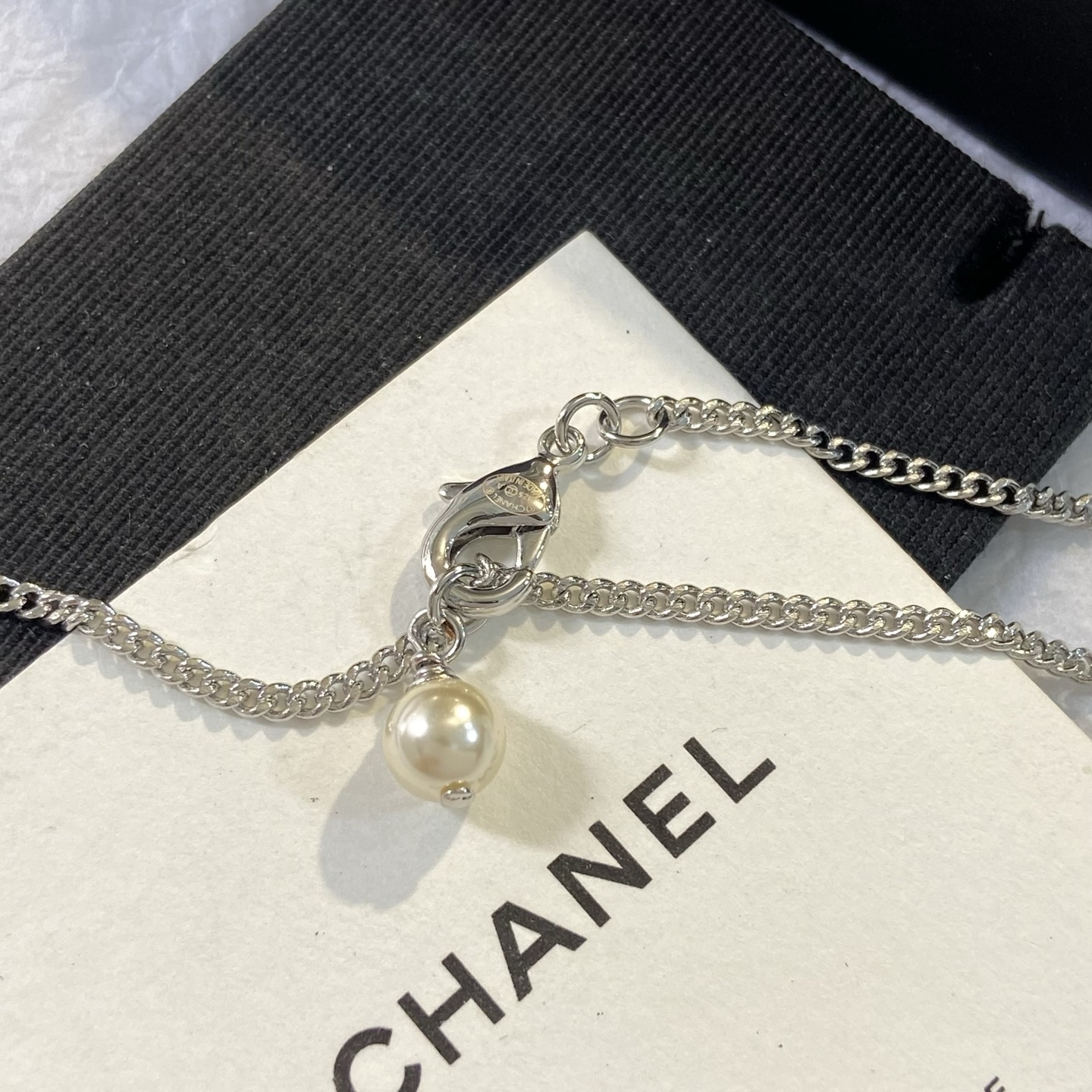 Chanel CC Star Pendant Necklace necklace Silver-tone metal clear resin with silver glitter white enamel CC logo white faux pearl 60cm
