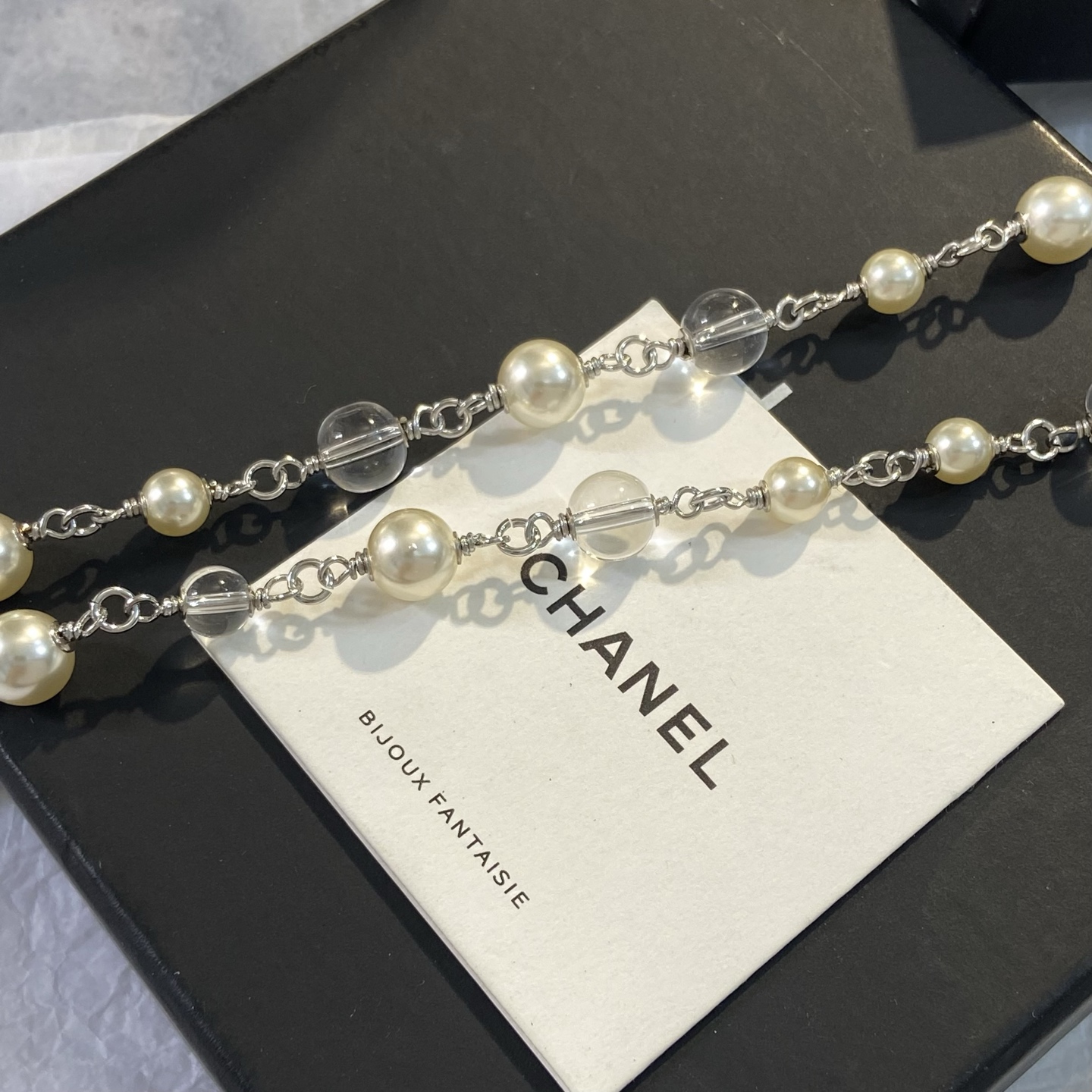 Chanel CC Glitter Star Pendant necklace Silver-tone metal cream faux pearl clear resin with silver glitter white CC logo 42cm with 5cm extender chain
