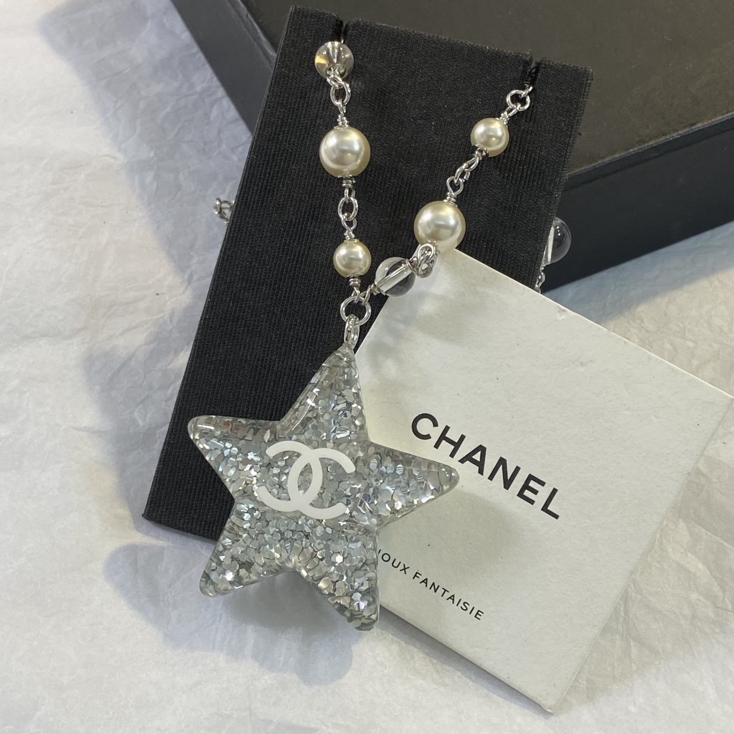Chanel CC Glitter Star Pendant necklace Silver-tone metal cream faux pearl clear resin with silver glitter white CC logo 42cm with 5cm extender chain