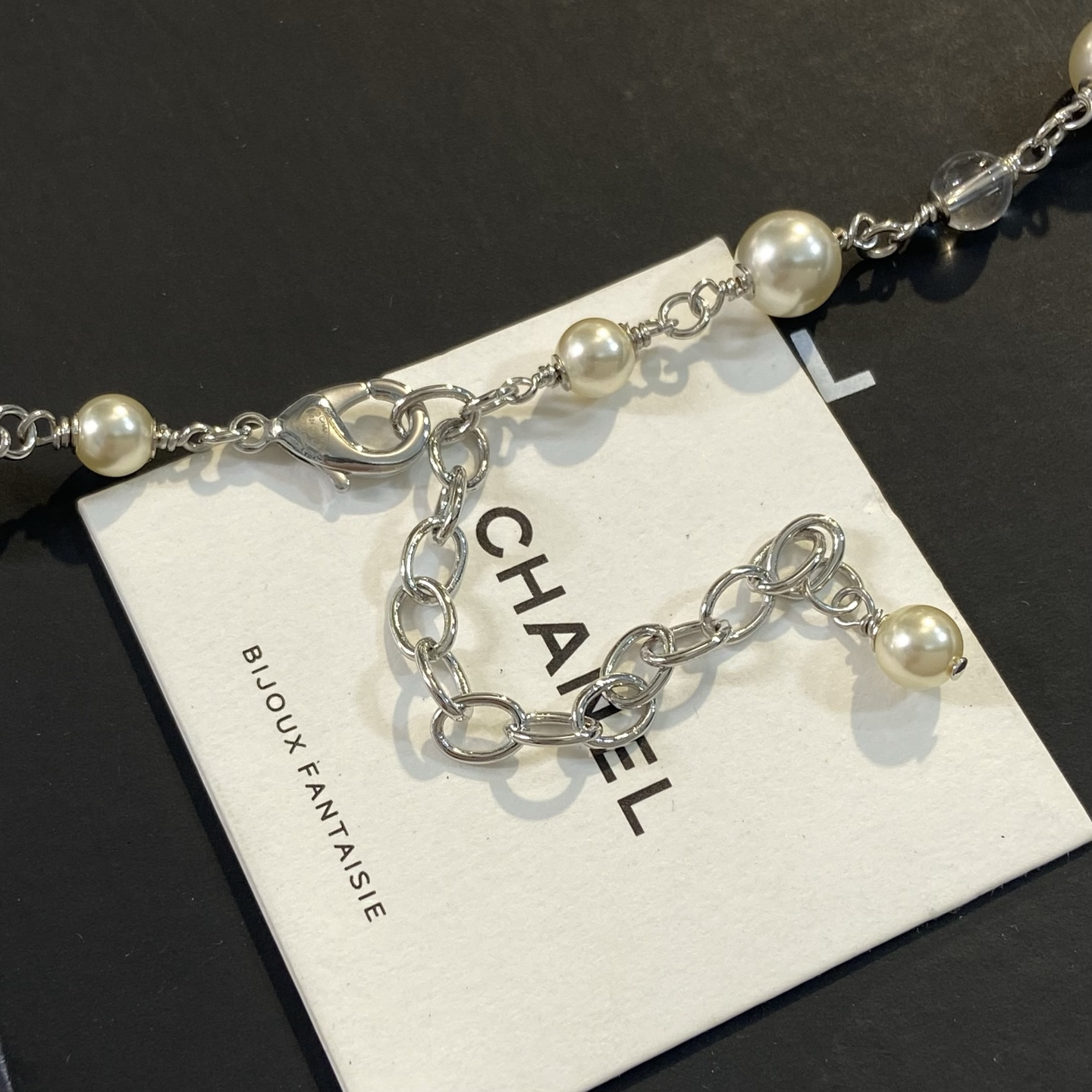Chanel CC Glitter Star Pendant necklace Silver-tone metal cream faux pearl clear resin with silver glitter white CC logo 42cm with 5cm extender chain