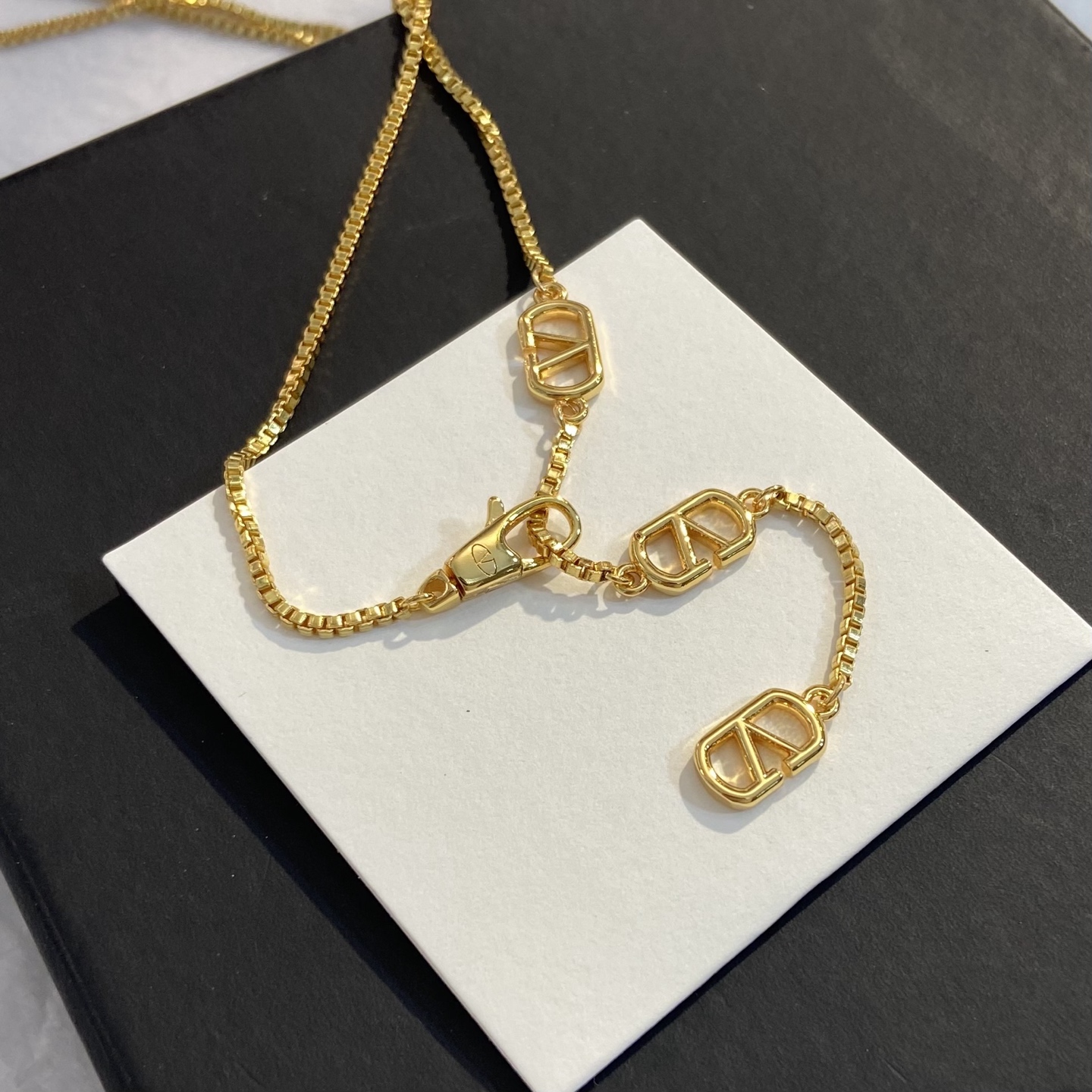 Valentino VLogo Signature Crystal Pendant necklace gold-tone metal with clear crystal rhinestones 45cm with 5cm extender