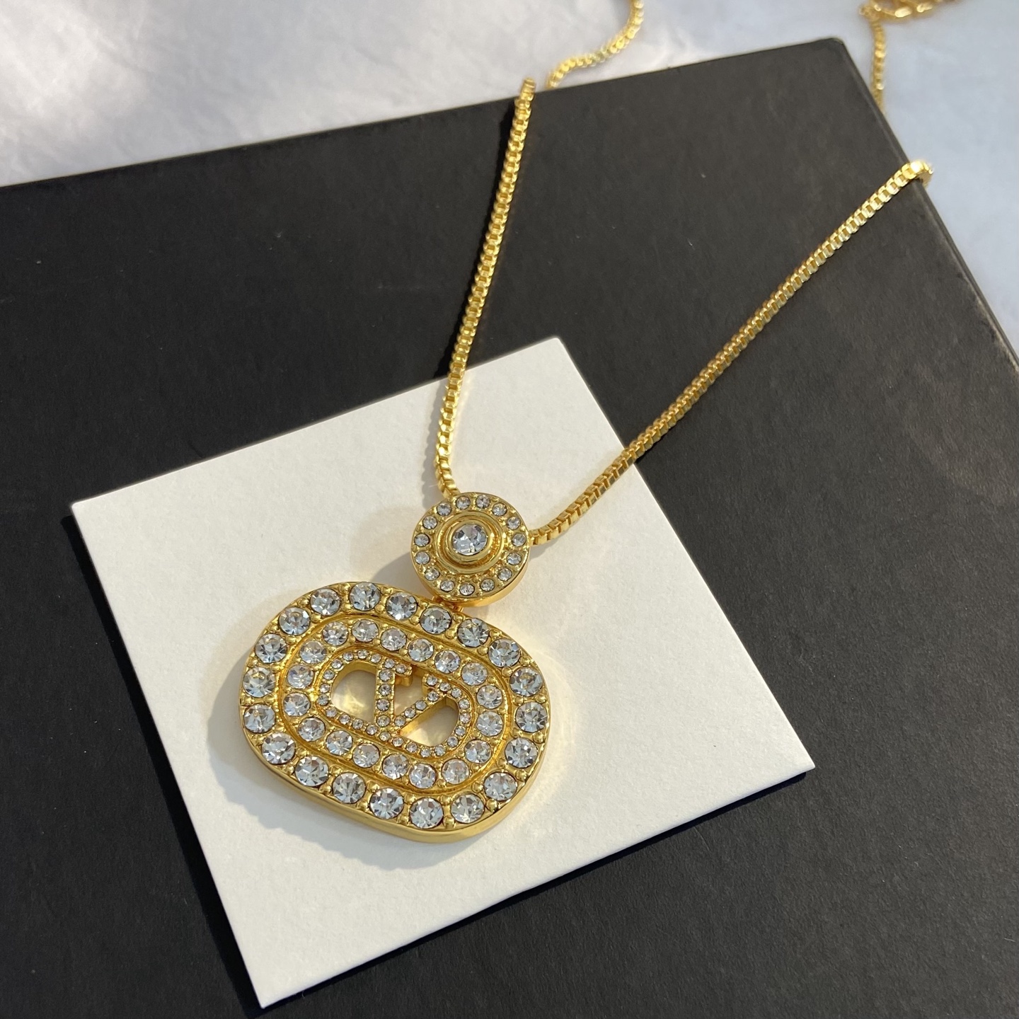 Valentino VLogo Signature Crystal Pendant necklace gold-tone metal with clear crystal rhinestones 45cm with 5cm extender