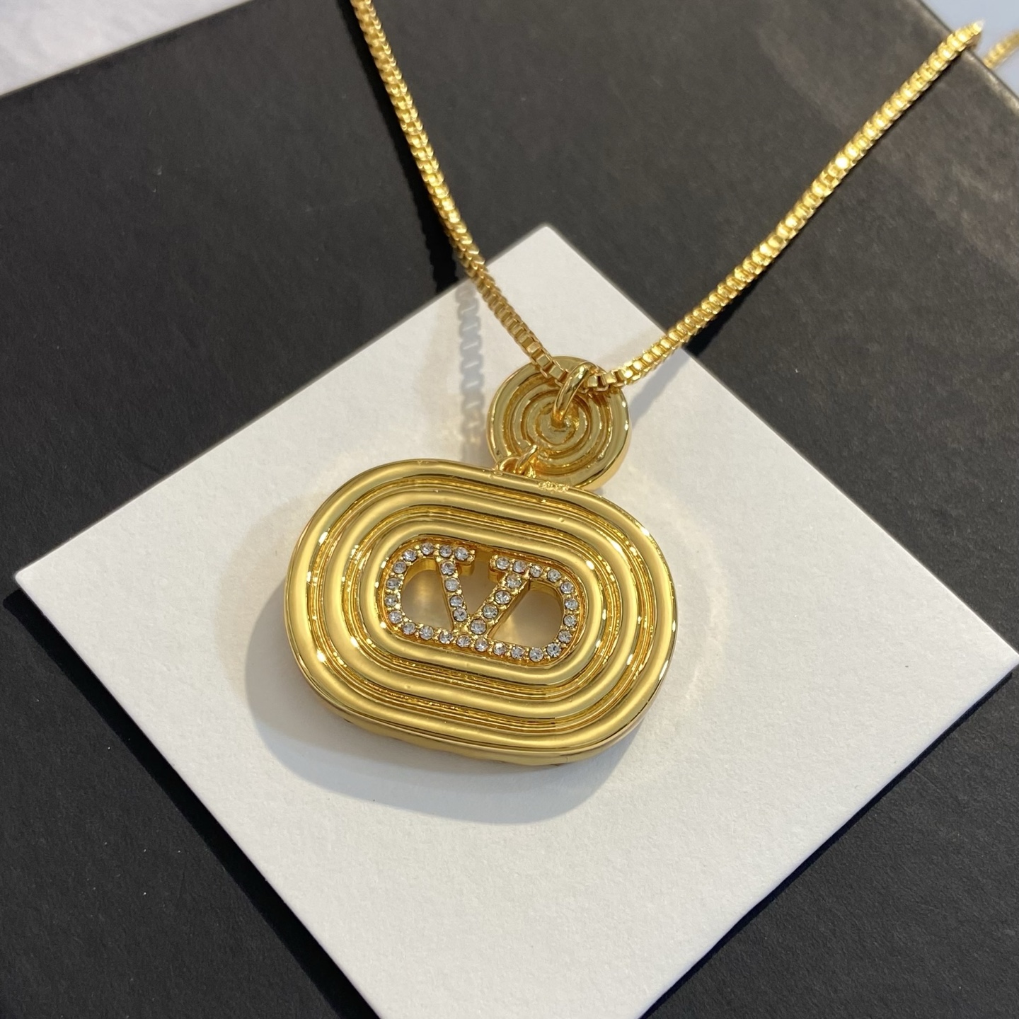 Valentino VLogo Signature Crystal Pendant necklace gold-tone metal with clear crystal rhinestones 45cm with 5cm extender