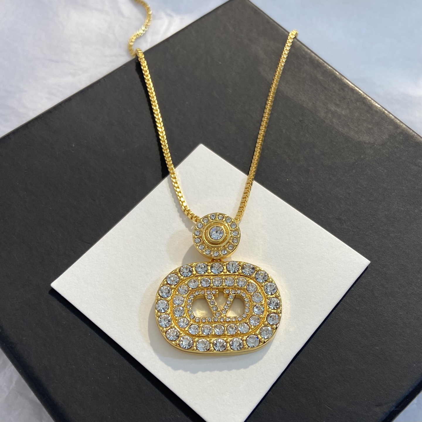 Valentino VLogo Signature Crystal Pendant necklace gold-tone metal with clear crystal rhinestones 45cm with 5cm extender