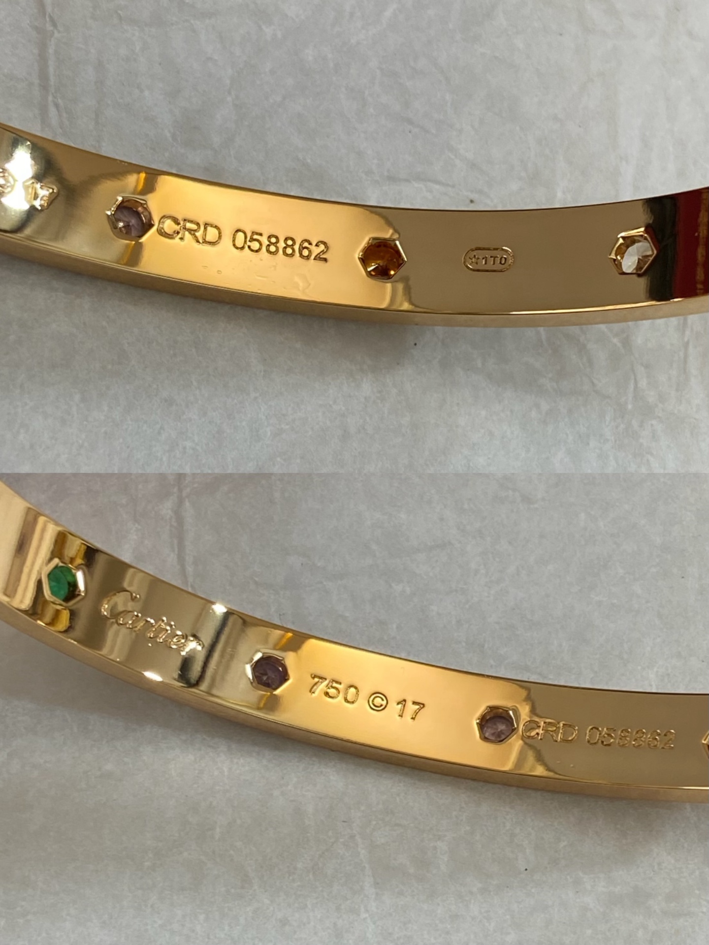 Cartier Love bracelet 18k yellow gold and 18k white gold with multi-color gemstones including pink sapphire blue sapphire green garnet amethyst orange garnet and diamond 17
