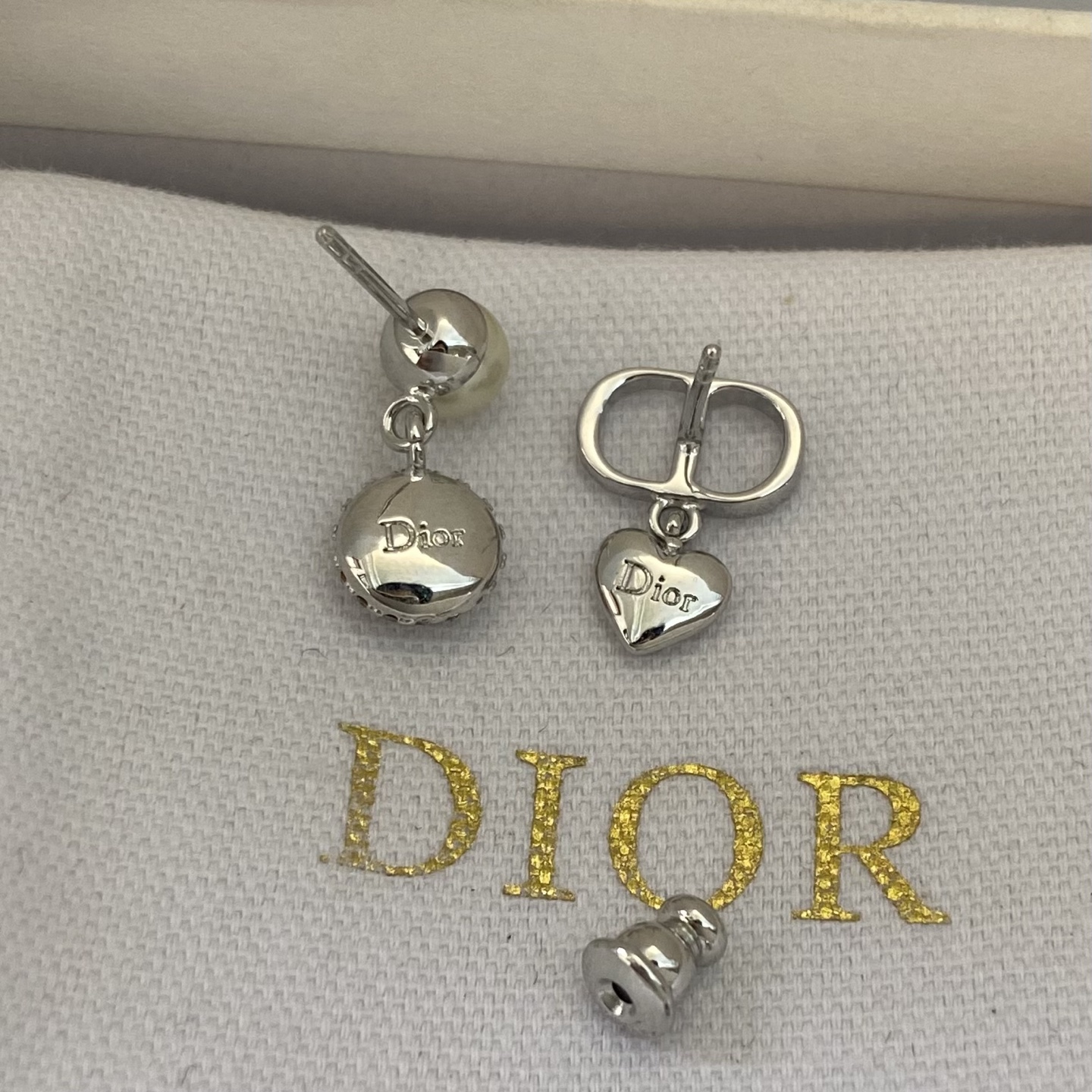 Dior CD Logo Mismatched Drop Earrings earrings Gold-tone metal with white faux pearl and clear crystal accents 1 5cm drop length