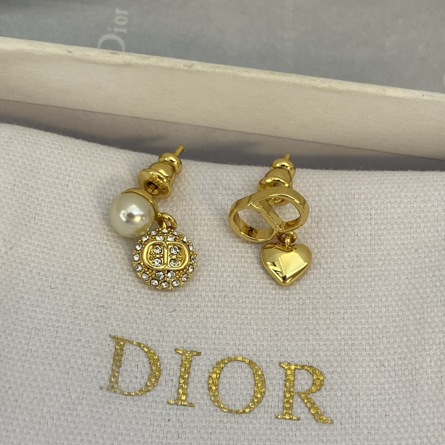 Dior CD Logo Mismatched Drop Earrings earrings Gold-tone metal with white faux pearl and clear crystal accents 1 5cm drop length