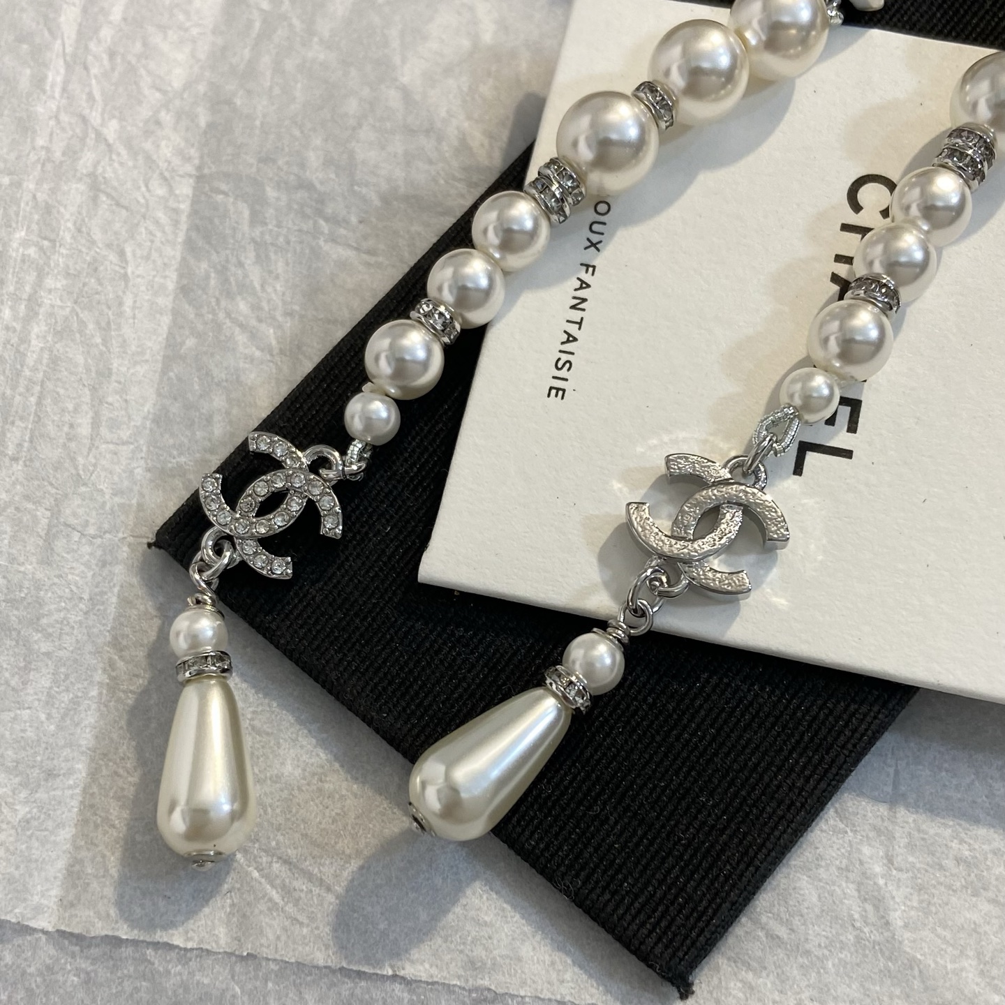 Chanel Dalmatian Long Tassel CC Drop Earrings earrings Silver-tone metal white faux pearls clear crystals green gemstone accents black enamel details Approximately 9cm total drop length
