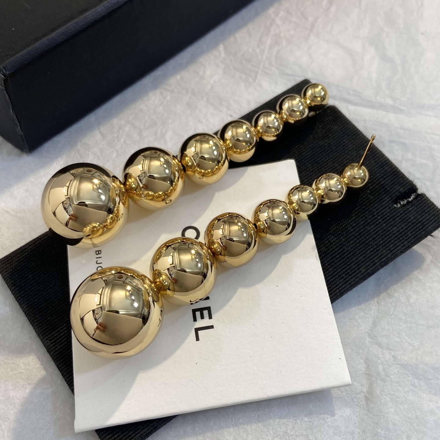Chanel CC Graduated Bead Drop Earrings earrings gold-tone metal with black enamel CC logo 7cm drop length