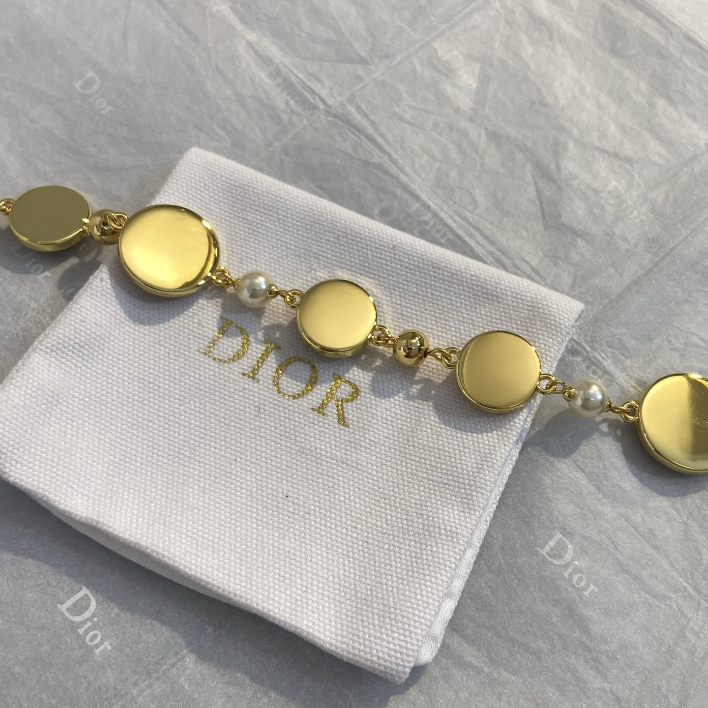 Dior Colorful Small Circle Lucky Charm Bracelet bracelet Gold-tone metal with white faux pearls multicolor enamel sage green dusty rose peach plum and gold-tone charms heart bee CD logo clover star 18cm with 5cm extension chain