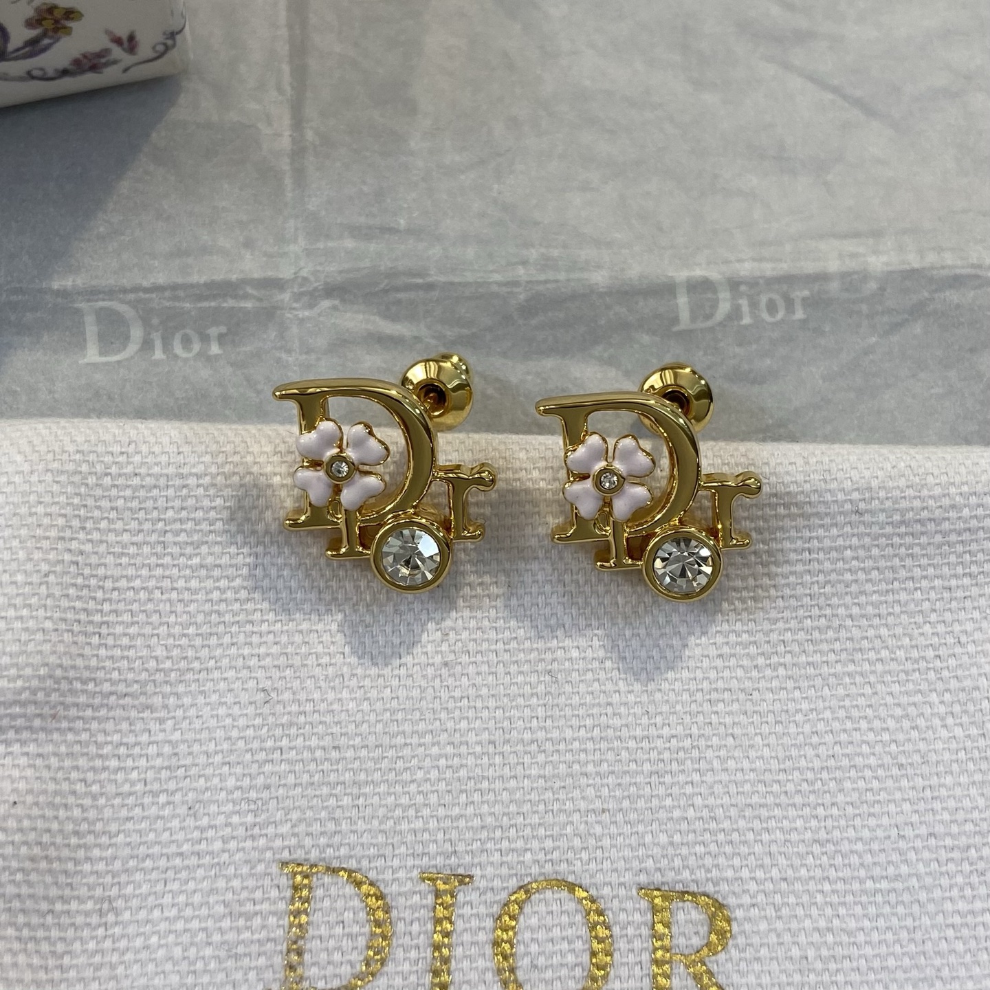 Dior Floral Letter Clover Stud Earrings earrings Gold-tone metal with clear crystals green enamel clover and white enamel clover accents One Size