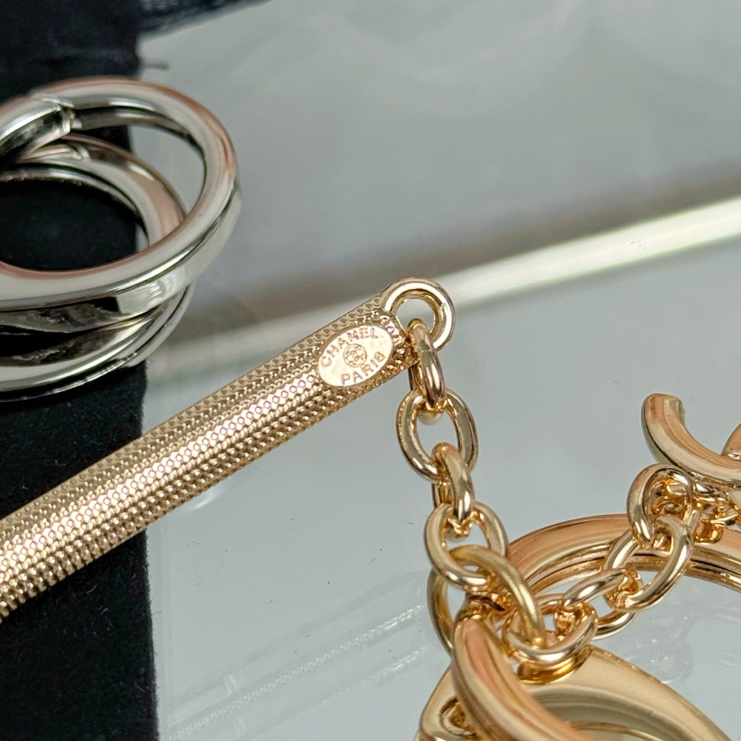 Chanel CC Tennis Racket Bag Charm Keychain pendant Gold-tone metal with clear crystals and white faux pearl Silver-tone metal with clear crystals and white faux pearl 10cm total length