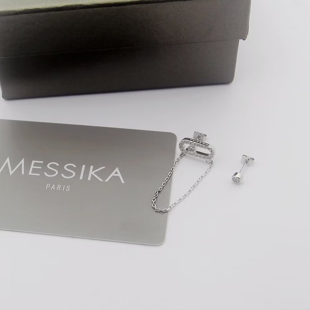 Messika Move Uno earrings Available in 18k yellow gold 18k white gold 18k rose gold set with colorless diamonds One size standard stud earring with 2cm drop chain