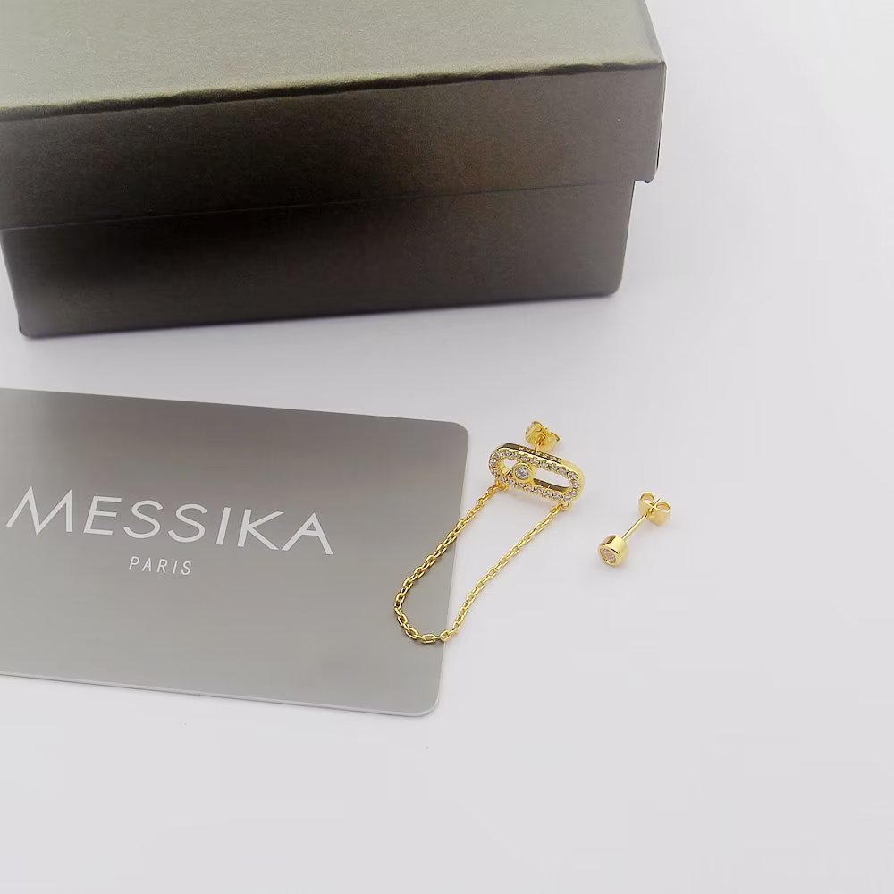 Messika Move Uno earrings Available in 18k yellow gold 18k white gold 18k rose gold set with colorless diamonds One size standard stud earring with 2cm drop chain