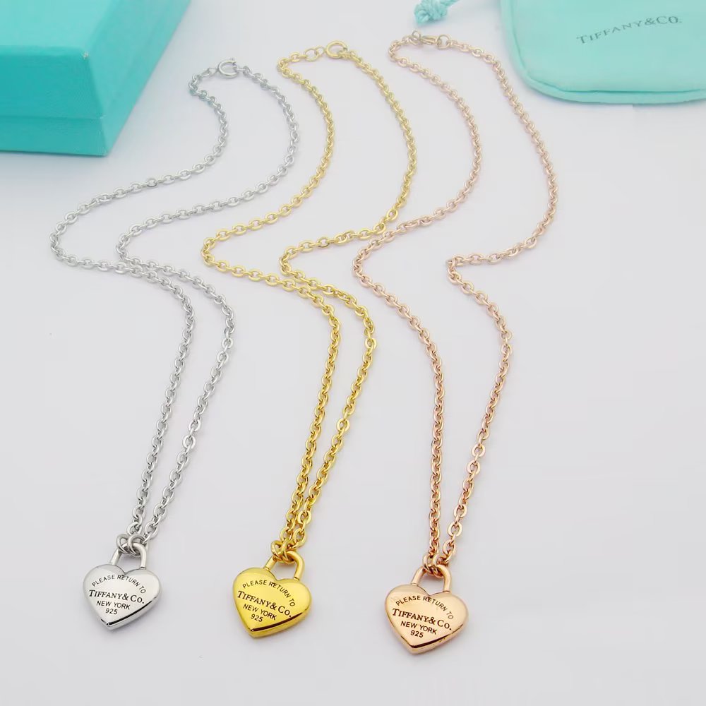 Tiffany Co Return to Tiffany Heart Lock Pendant necklace Sterling silver 18k yellow gold 18k rose gold no gemstones 18 inches