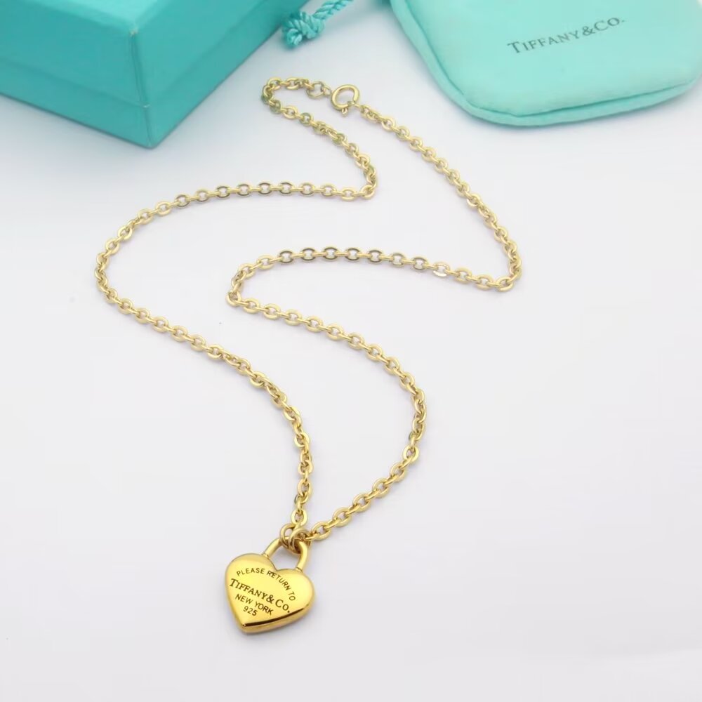 Tiffany Co Return to Tiffany Heart Lock Pendant necklace Sterling silver 18k yellow gold 18k rose gold no gemstones 18 inches