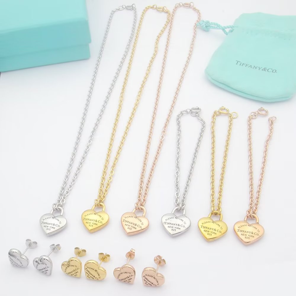 Tiffany Co Return to Tiffany Heart Lock Pendant necklace Sterling silver 18k yellow gold 18k rose gold no gemstones 18 inches
