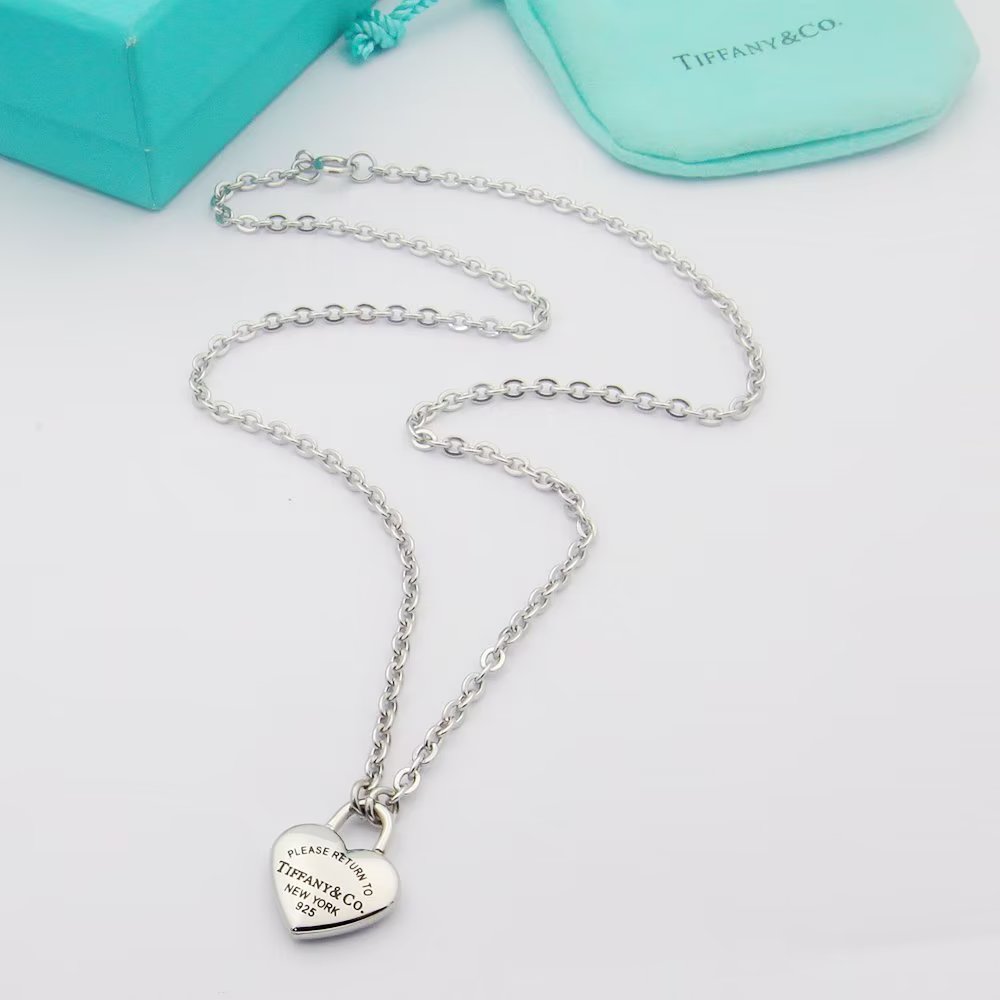 Tiffany Co Return to Tiffany Heart Lock Pendant necklace Sterling silver 18k yellow gold 18k rose gold no gemstones 18 inches