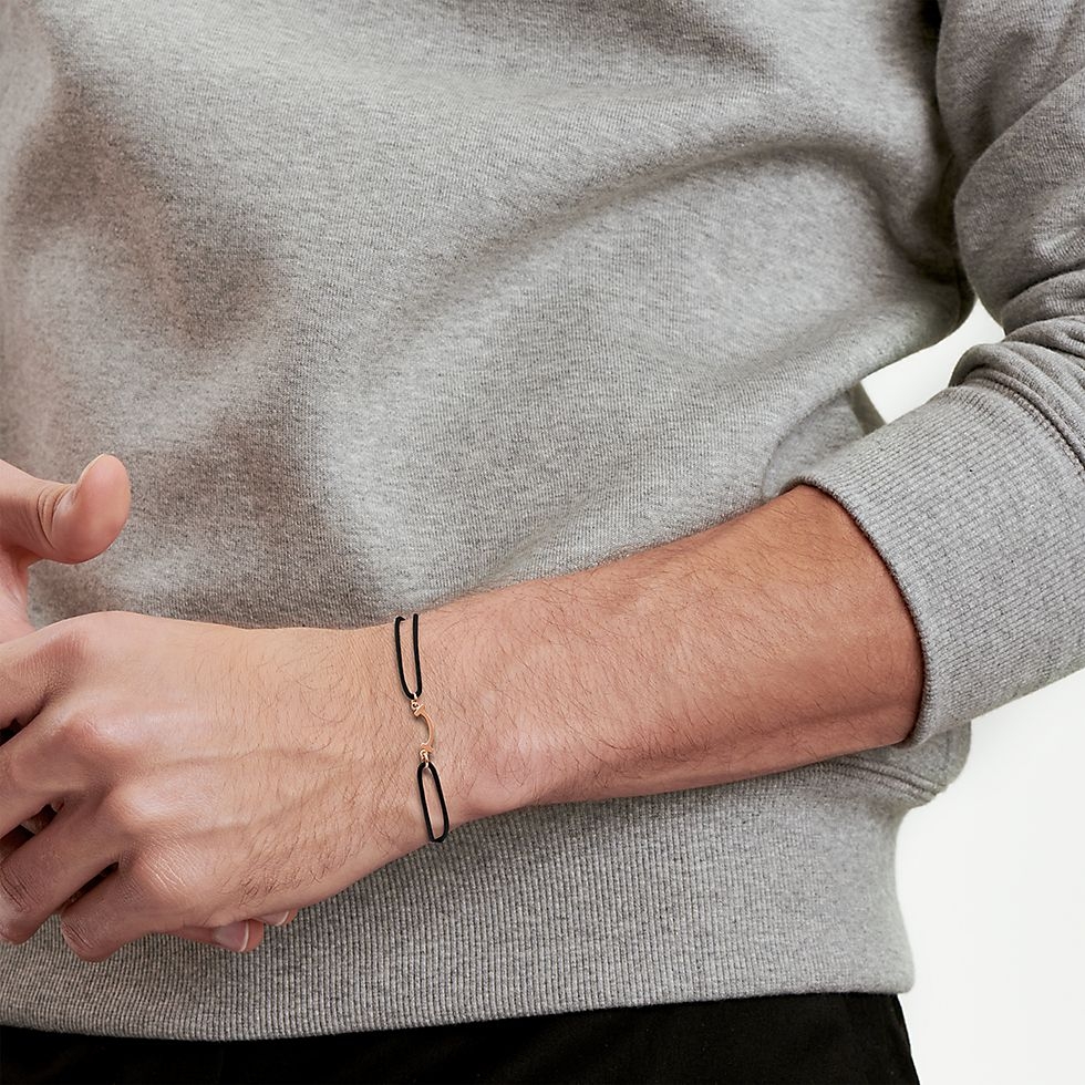 Tiffany Co T Smile bracelet available in yellow gold rose gold silver metal finishes with red black or Tiffany blue cord adjustable sliding knot cord fits 15-20cm wrist
