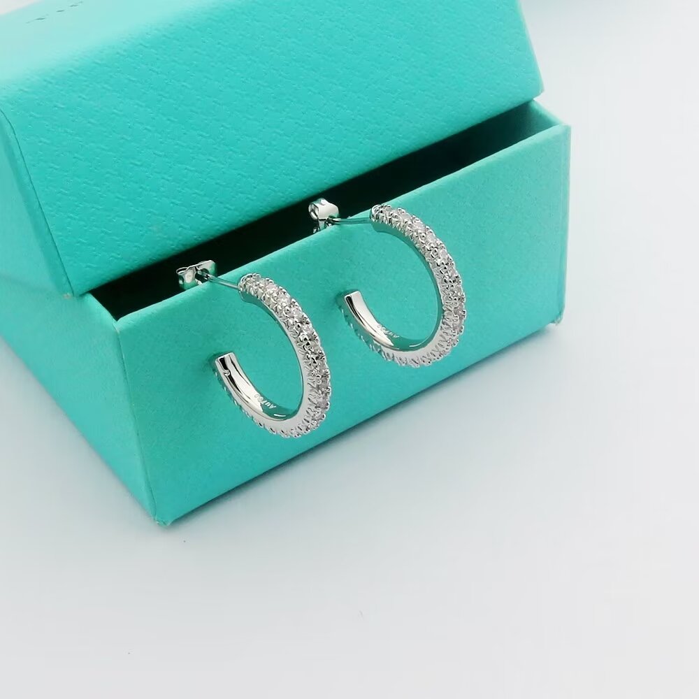 Tiffany T1 earrings 18k rose gold with pave set clear diamonds 15mm hoop diameter