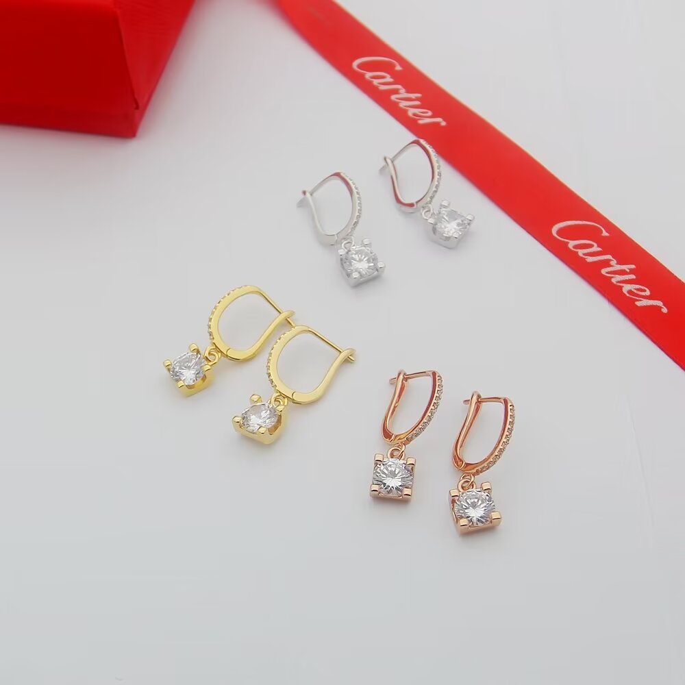 Cartier C de Cartier Diamond Drop Earrings earrings Yellow gold with clear round-cut diamond simulants red enamel accent available variants in rose gold and white gold with clear stones 15mm drop length