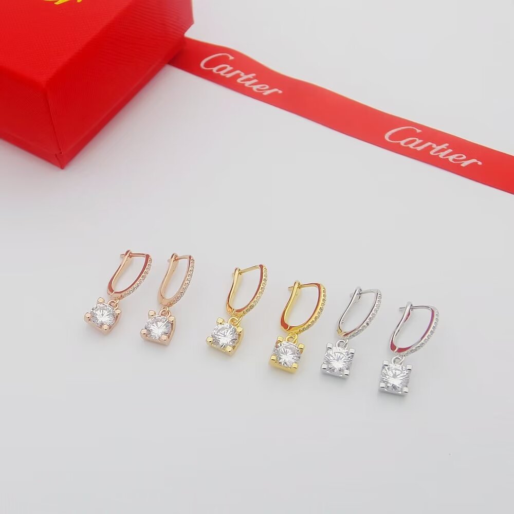 Cartier C de Cartier Diamond Drop Earrings earrings Yellow gold with clear round-cut diamond simulants red enamel accent available variants in rose gold and white gold with clear stones 15mm drop length