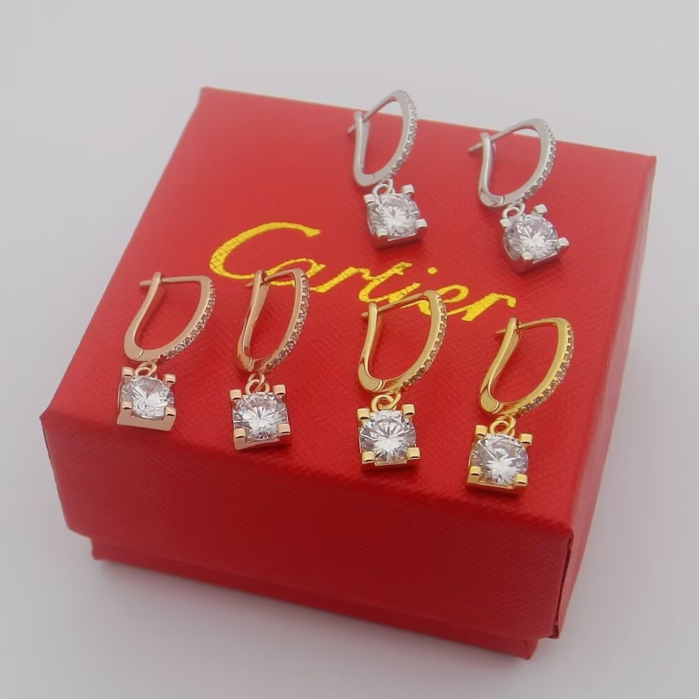 Cartier C de Cartier Diamond Drop Earrings earrings Yellow gold with clear round-cut diamond simulants red enamel accent available variants in rose gold and white gold with clear stones 15mm drop length