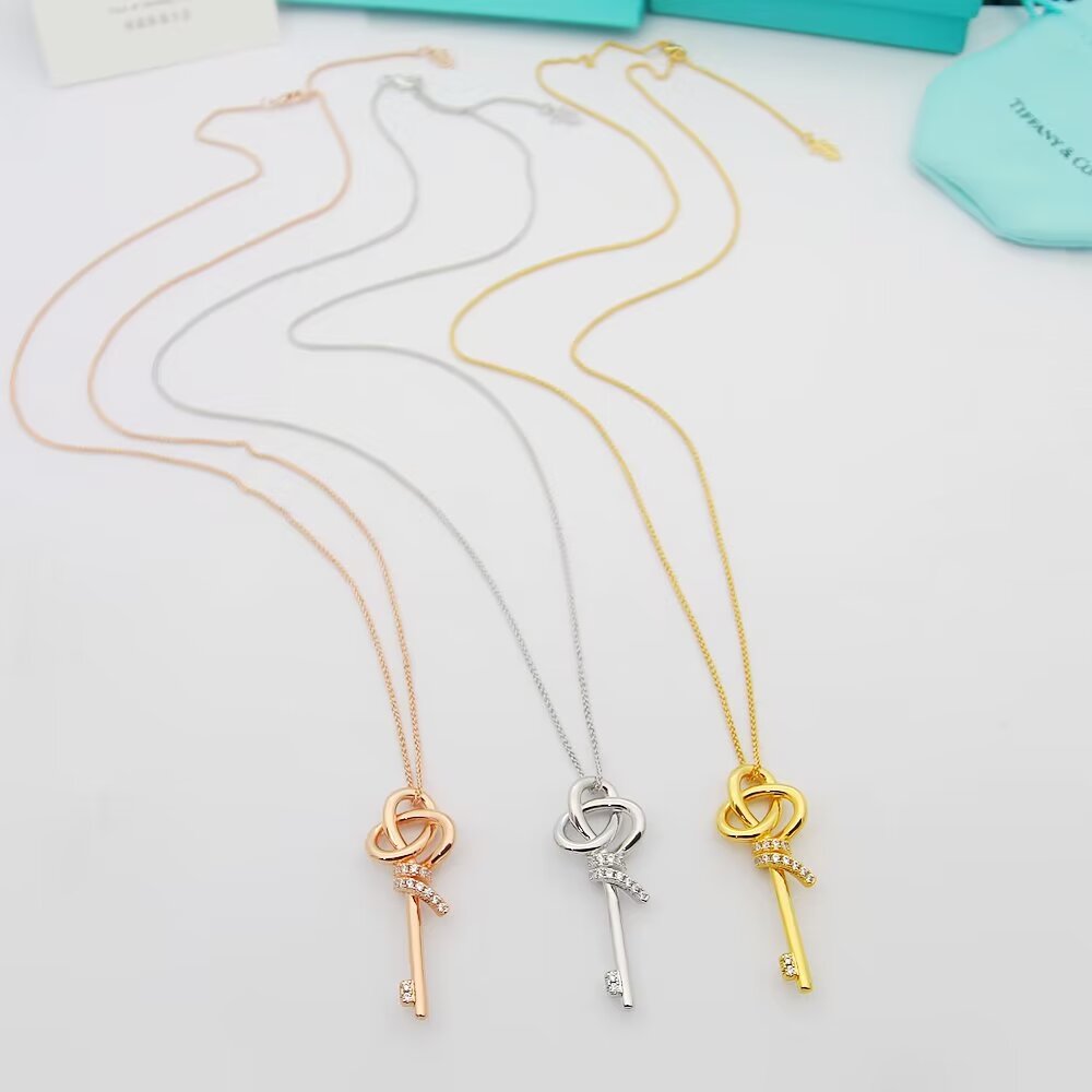 Tiffany Co Woven Keys necklace 18k rose gold with diamond accents 18 inches