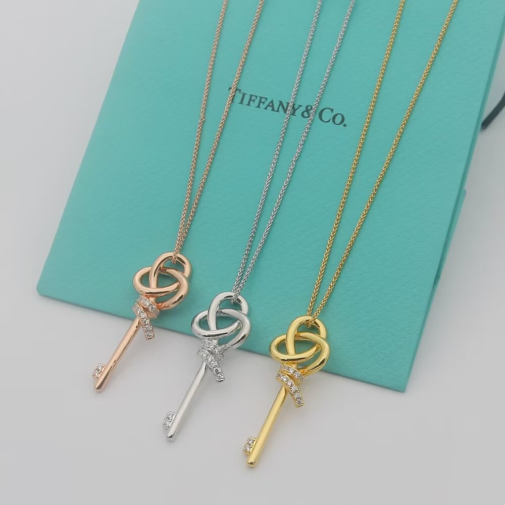 Tiffany Co Woven Keys necklace 18k rose gold with diamond accents 18 inches