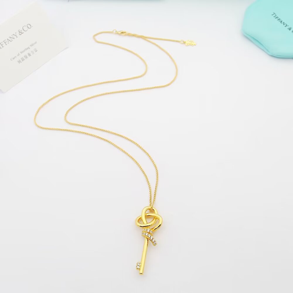 Tiffany Co Woven Keys necklace 18k rose gold with diamond accents 18 inches
