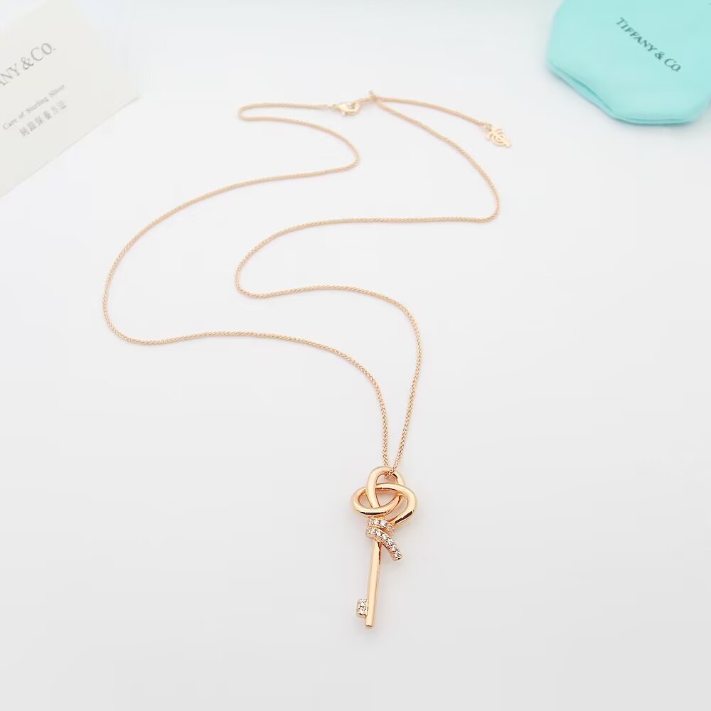 Tiffany Co Woven Keys necklace 18k rose gold with diamond accents 18 inches