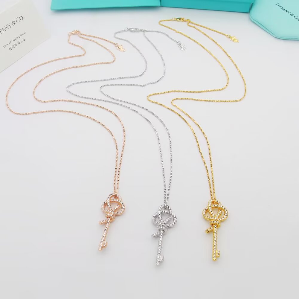 Tiffany Co Tiffany Keys Woven Key necklace 18k rose gold with pave diamonds 18 inches