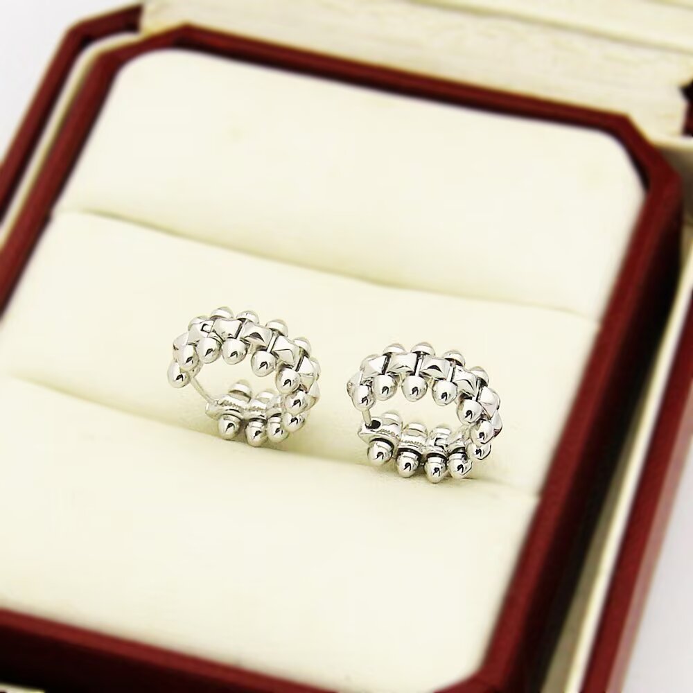 Cartier Clash de Cartier earrings Available in 18k yellow gold 18k rose gold and 18k white gold no gemstones 12mm outer diameter